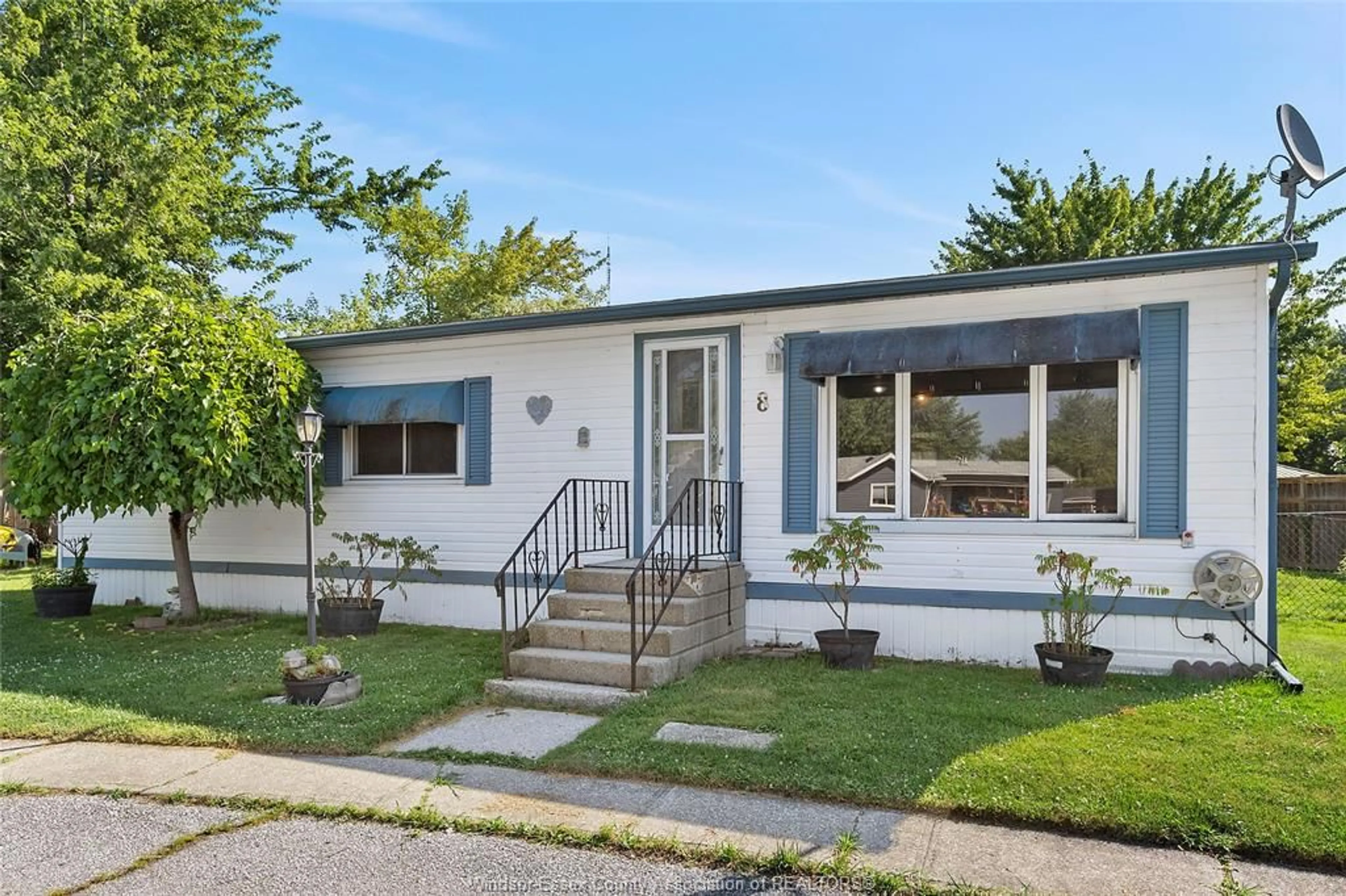 Home with vinyl exterior material, street for 8 HICKORY, McGregor Ontario N0R 1J0