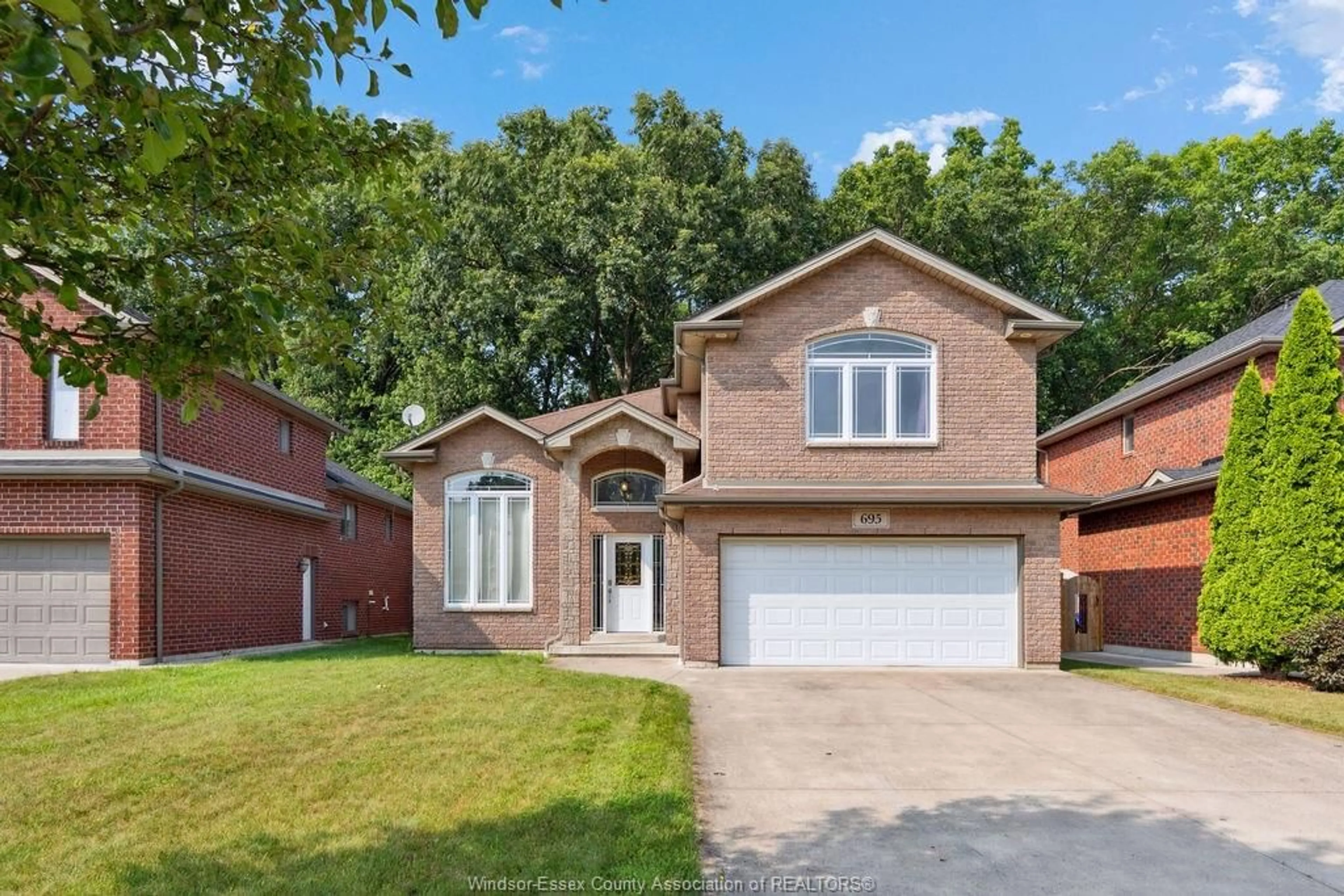 Home with brick exterior material, street for 695 INTERNATIONAL Ave, LaSalle Ontario N9J 0A5