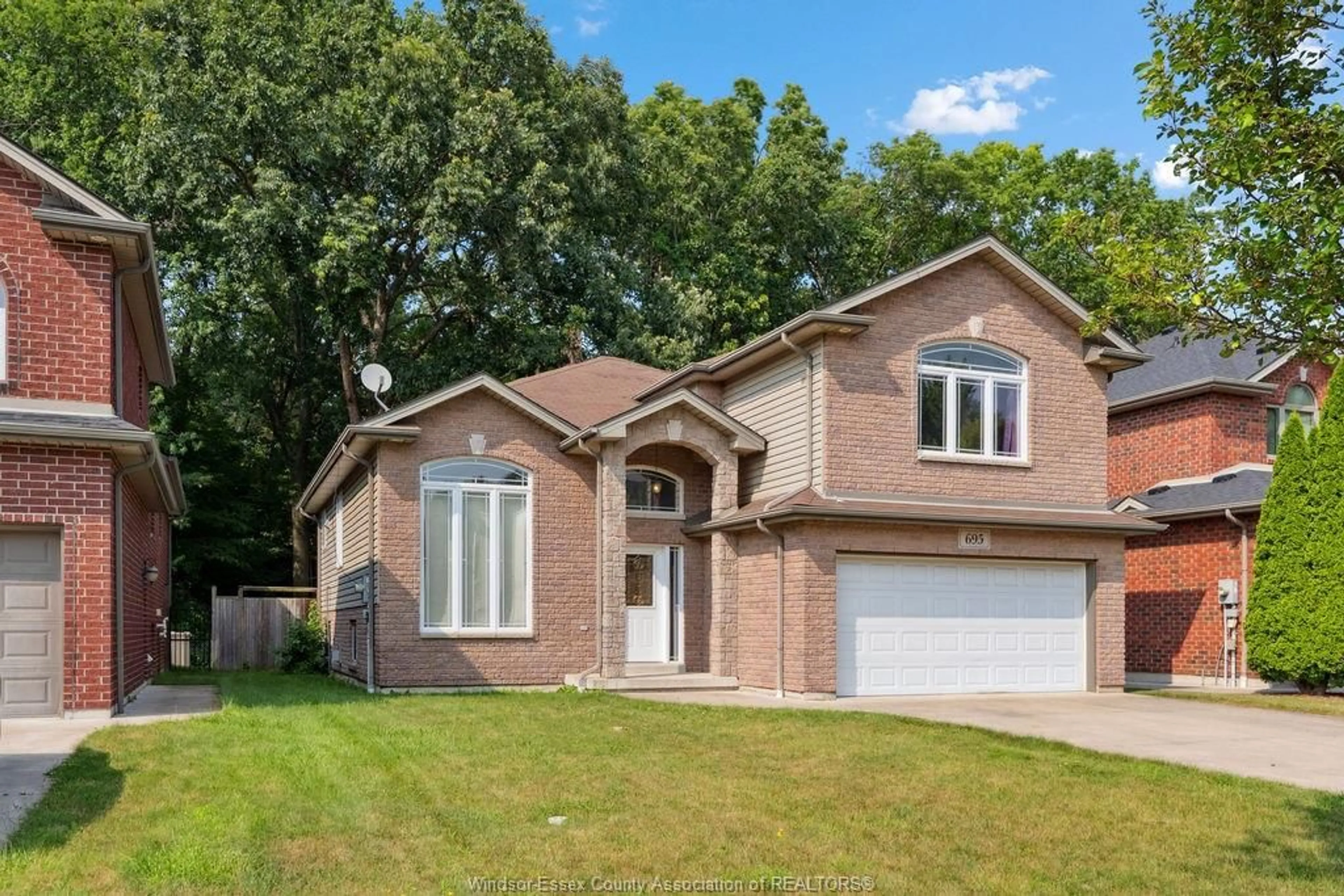 Home with brick exterior material, street for 695 INTERNATIONAL Ave, LaSalle Ontario N9J 0A5