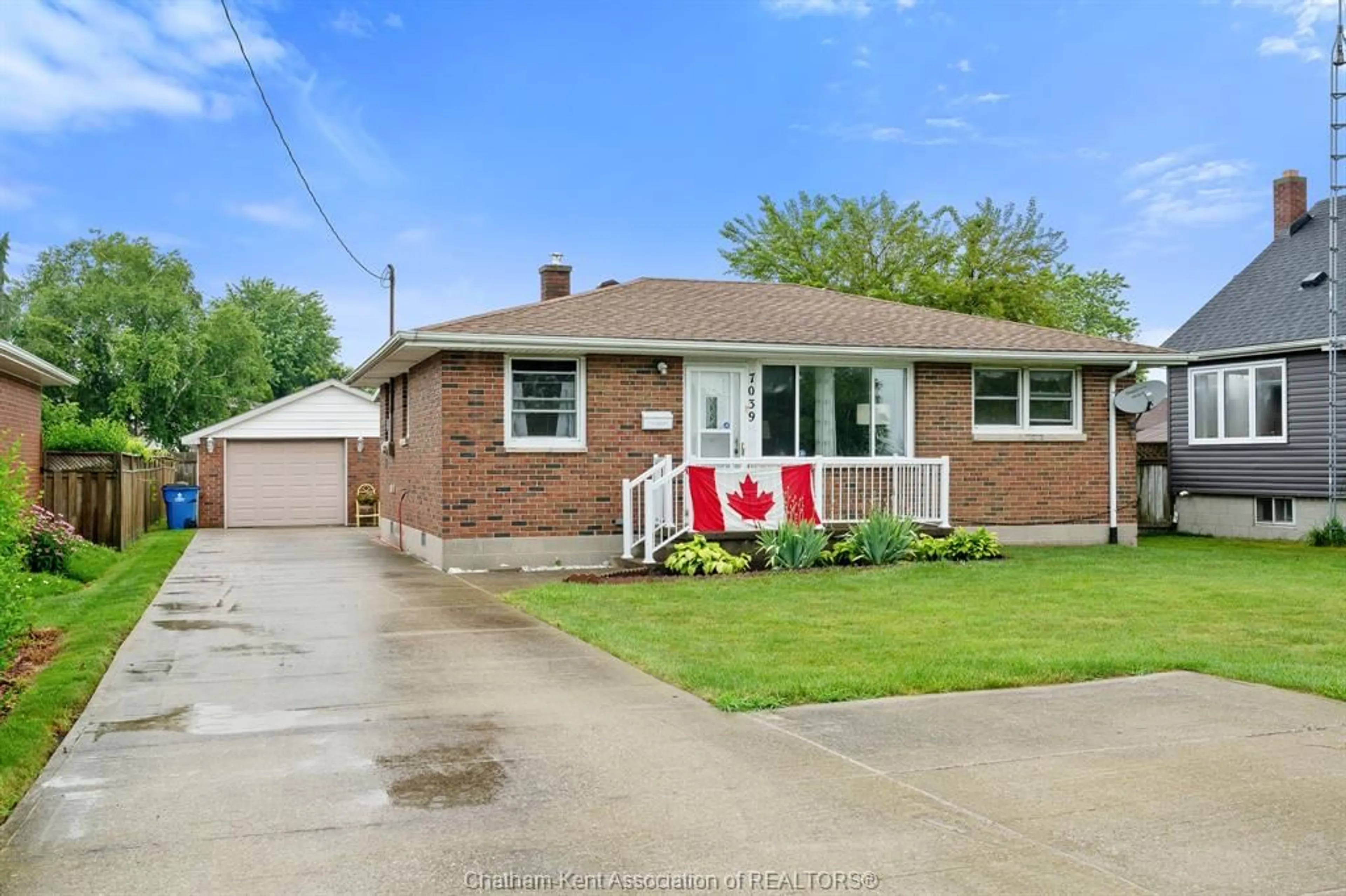 Home with brick exterior material, street for 7039 BASE Line, Wallaceburg Ontario N8A 1A2
