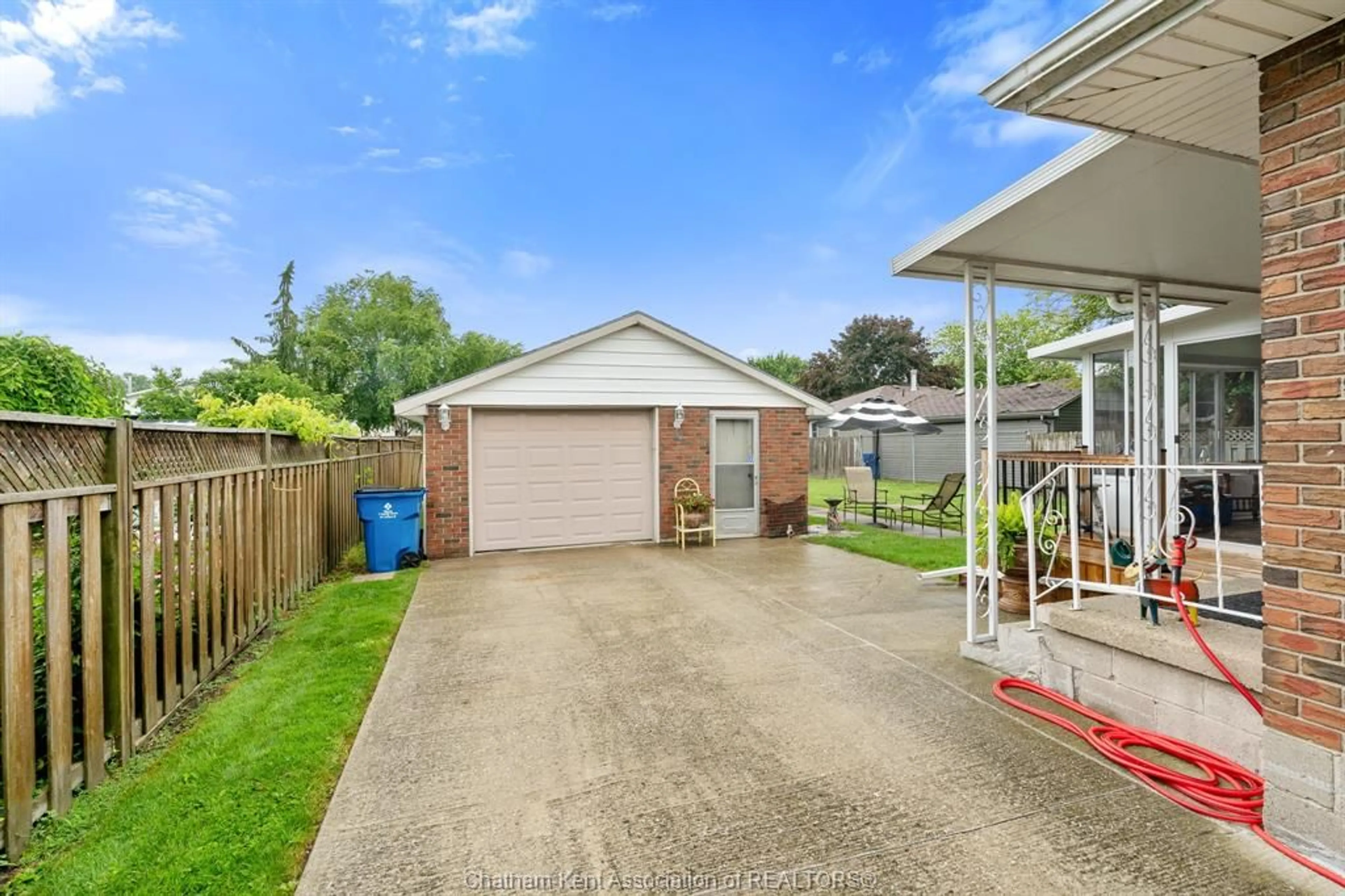 A pic from outside/outdoor area/front of a property/back of a property/a pic from drone, street for 7039 BASE Line, Wallaceburg Ontario N8A 1A2