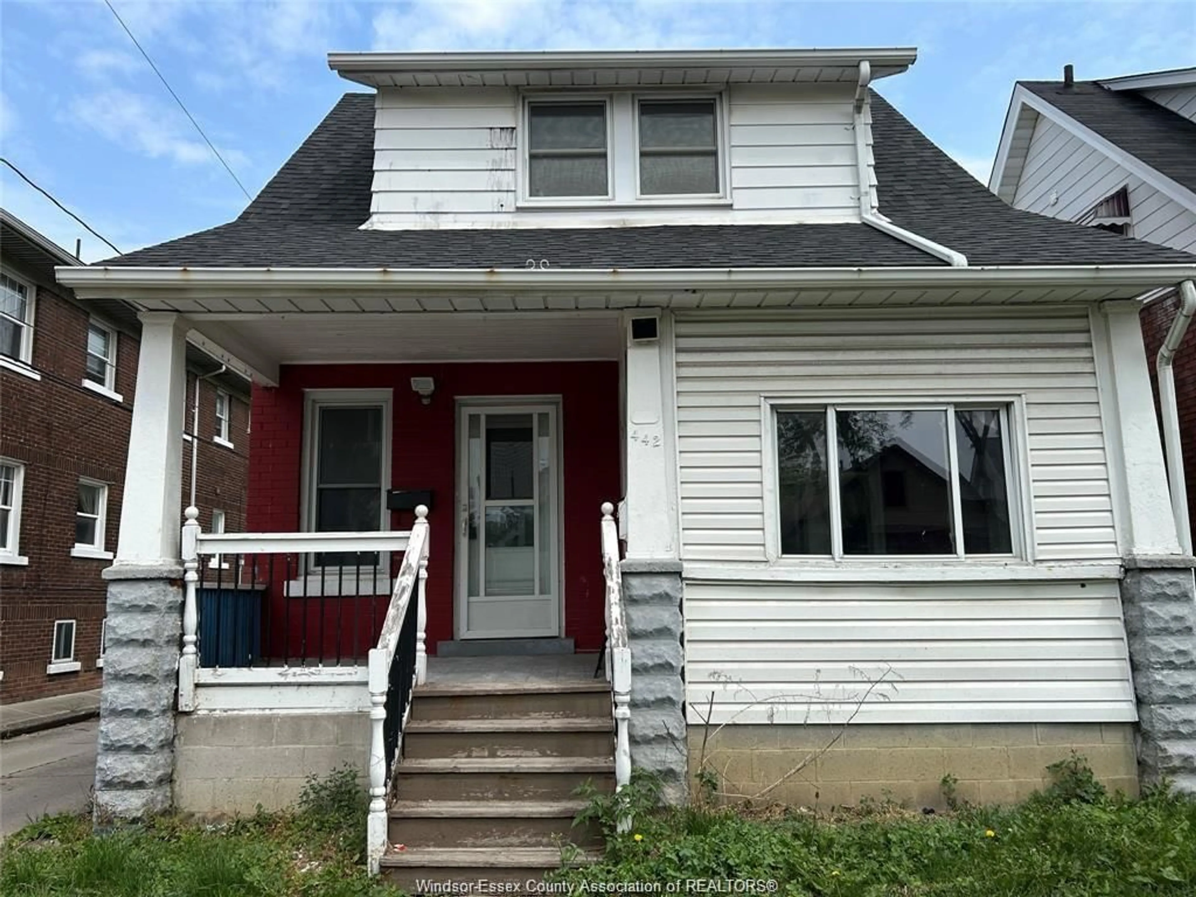 Home with vinyl exterior material, street for 442 ERIE St, Windsor Ontario N9A 6B9