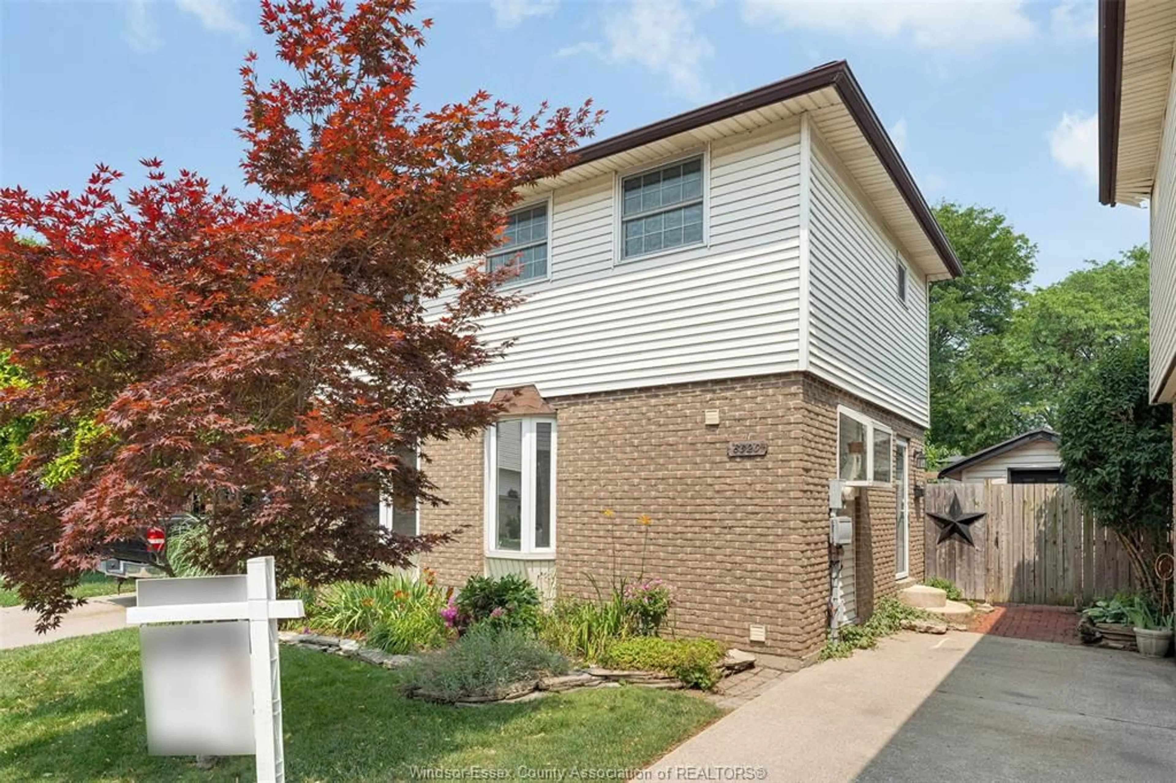 Home with brick exterior material, street for 8320 East Moor Court, Windsor Ontario N8S 4M7