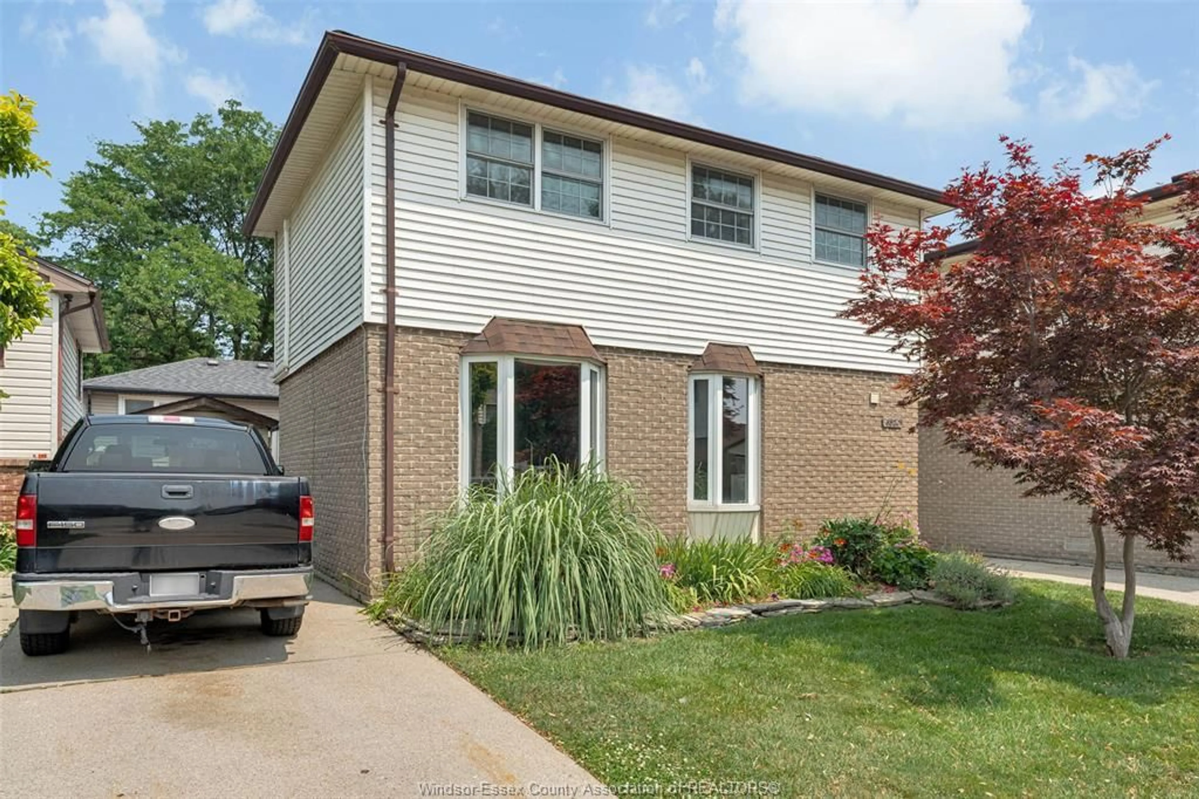 Home with brick exterior material, street for 8320 East Moor Court, Windsor Ontario N8S 4M7