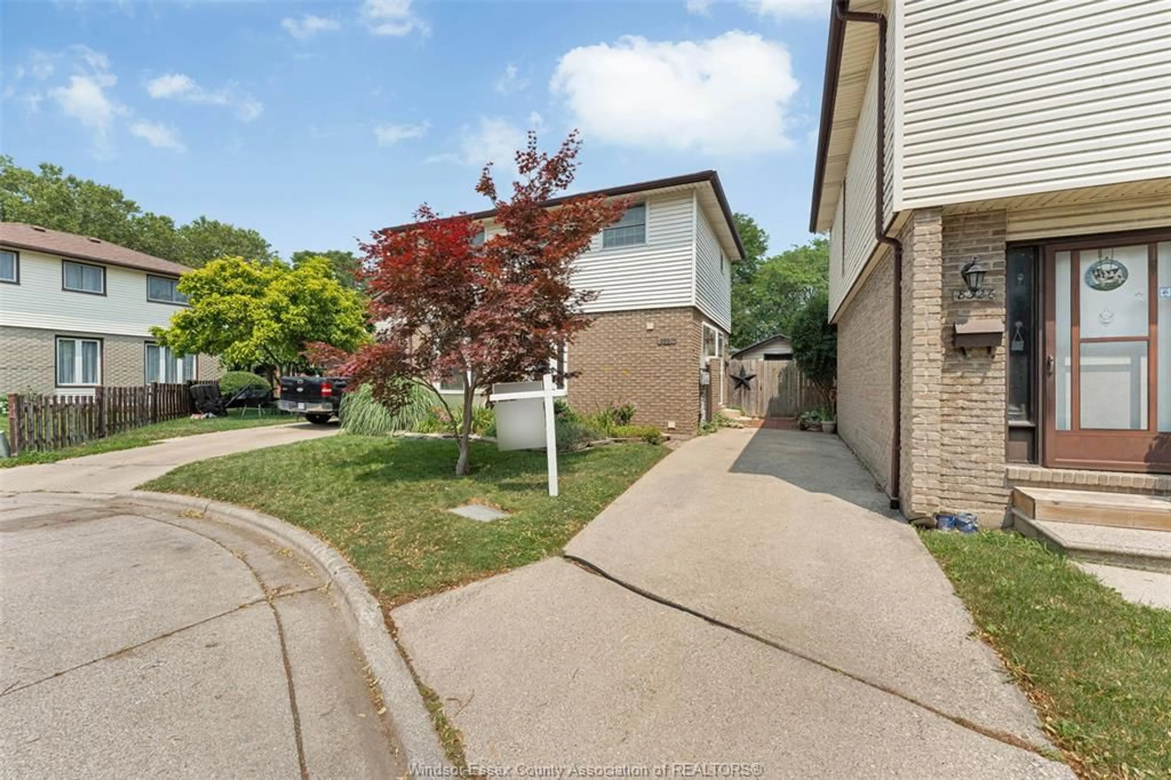 A pic from outside/outdoor area/front of a property/back of a property/a pic from drone, street for 8320 East Moor Court, Windsor Ontario N8S 4M7