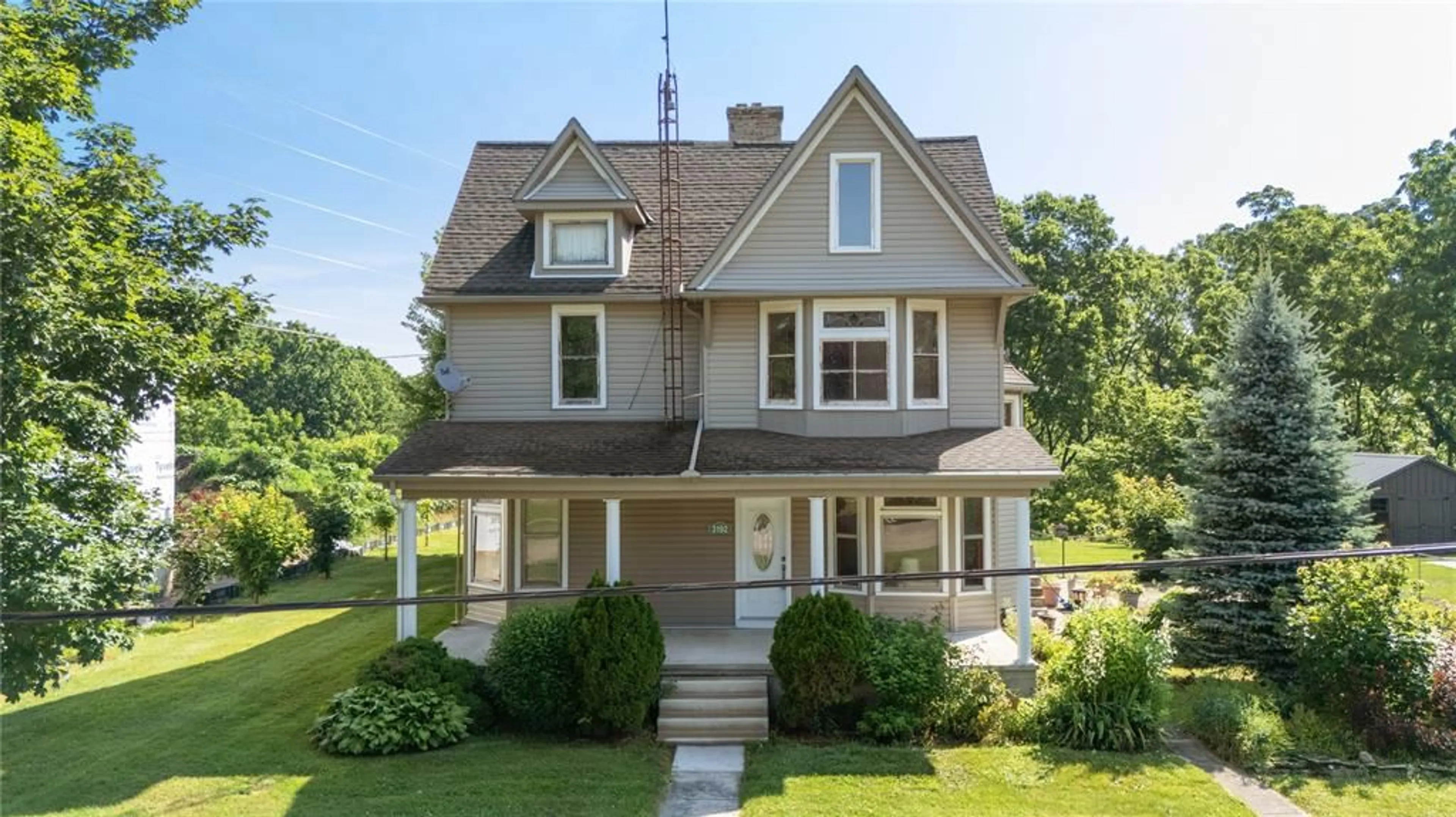 Home with vinyl exterior material, street for 3192 RIVER Rd, Brooke-Alvinston Ontario N0N 1A0