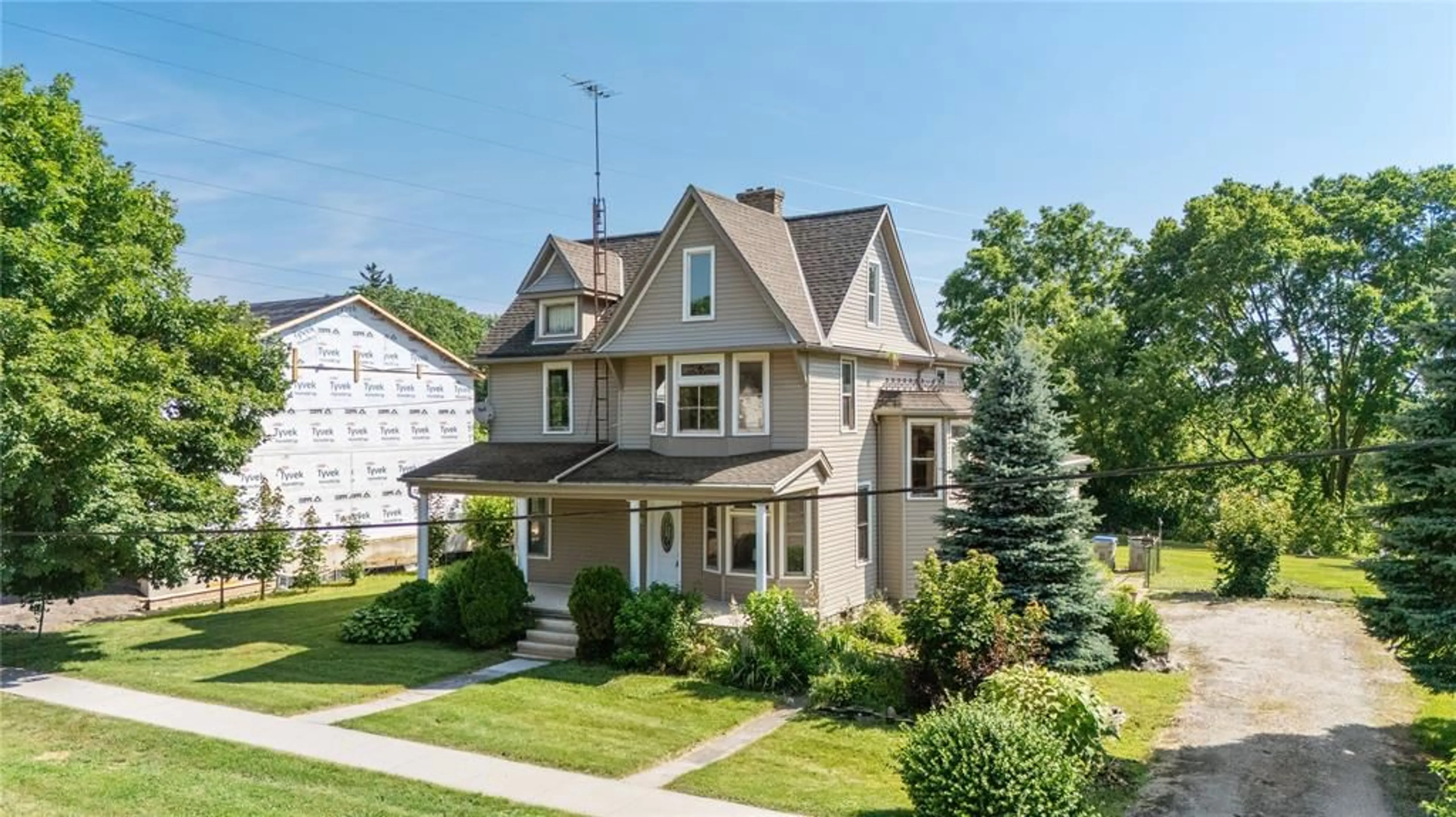 Home with vinyl exterior material, street for 3192 RIVER Rd, Brooke-Alvinston Ontario N0N 1A0