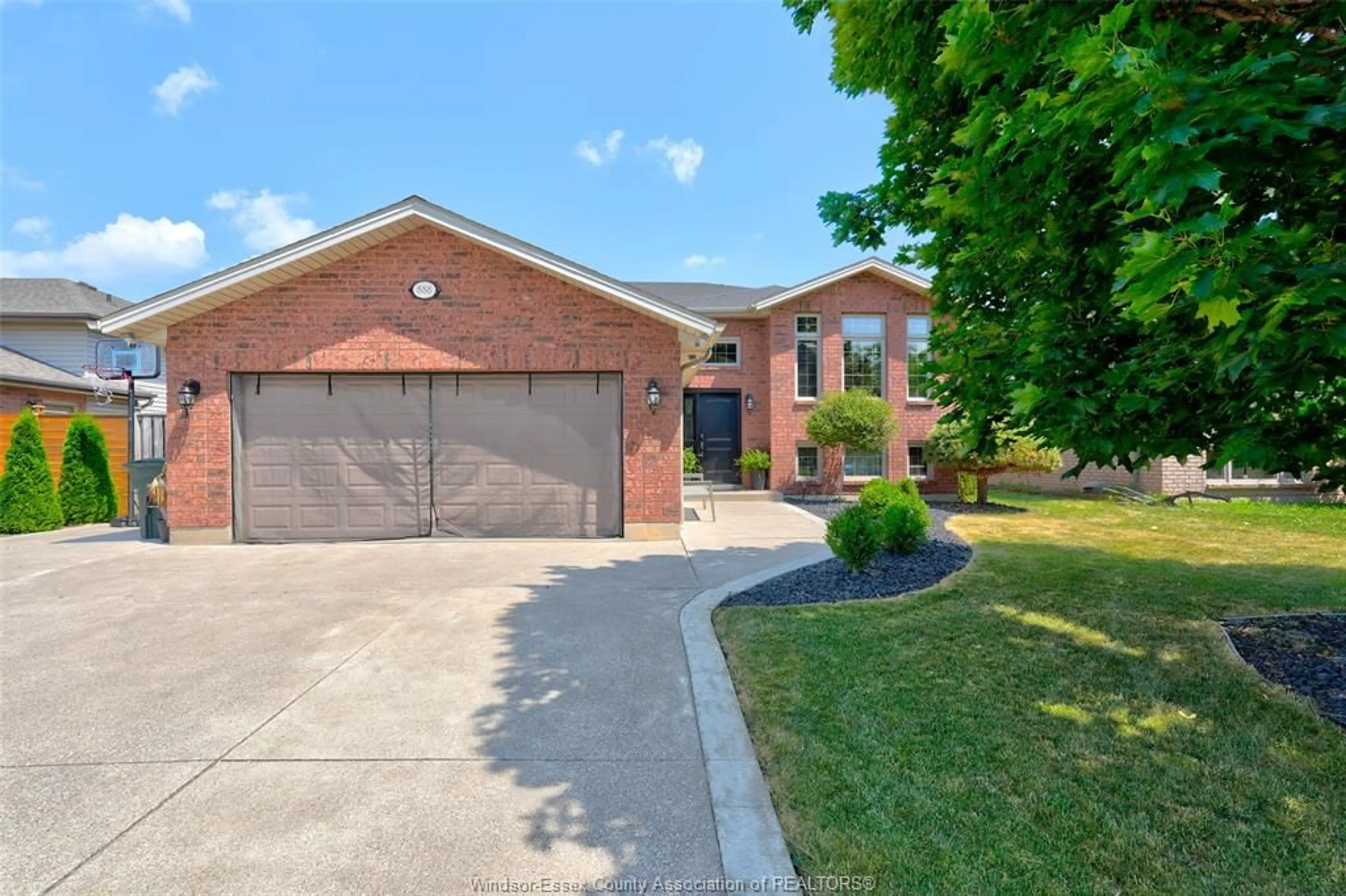 Home with brick exterior material, street for 888 SOUTHWOOD, Lakeshore Ontario N8L 1G2