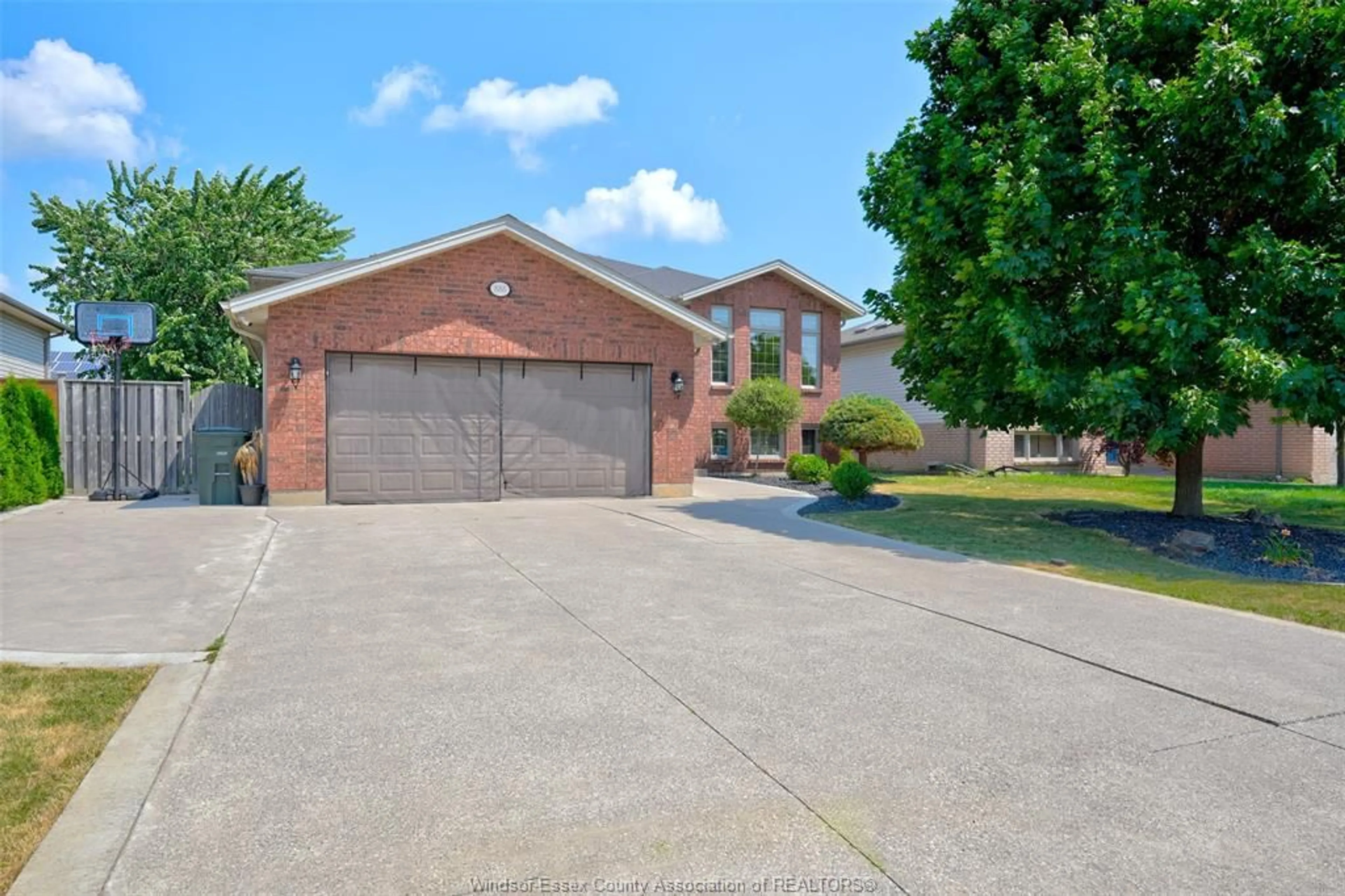 Home with brick exterior material, street for 888 SOUTHWOOD, Lakeshore Ontario N8L 1G2