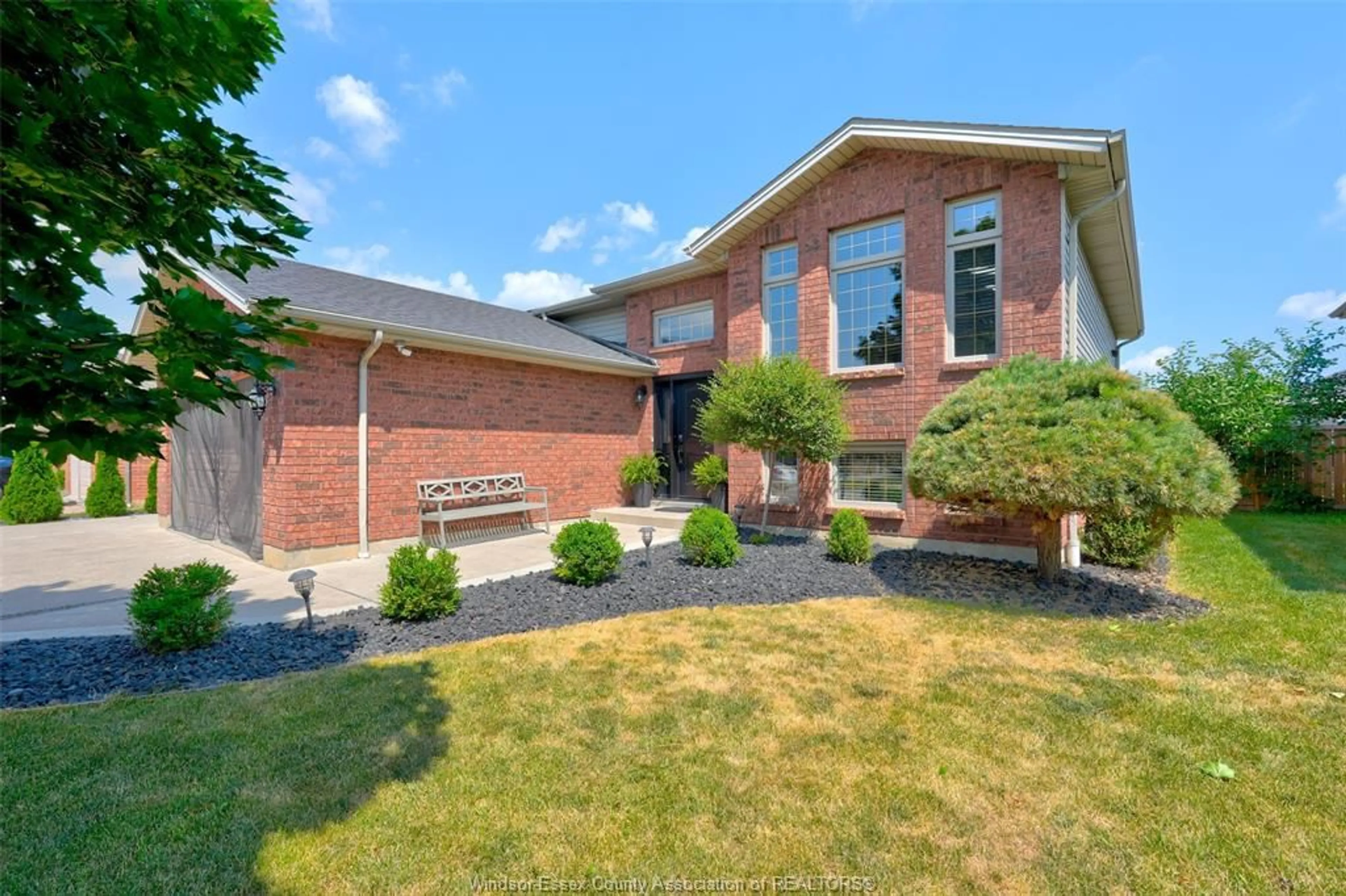 Home with brick exterior material, street for 888 SOUTHWOOD, Lakeshore Ontario N8L 1G2