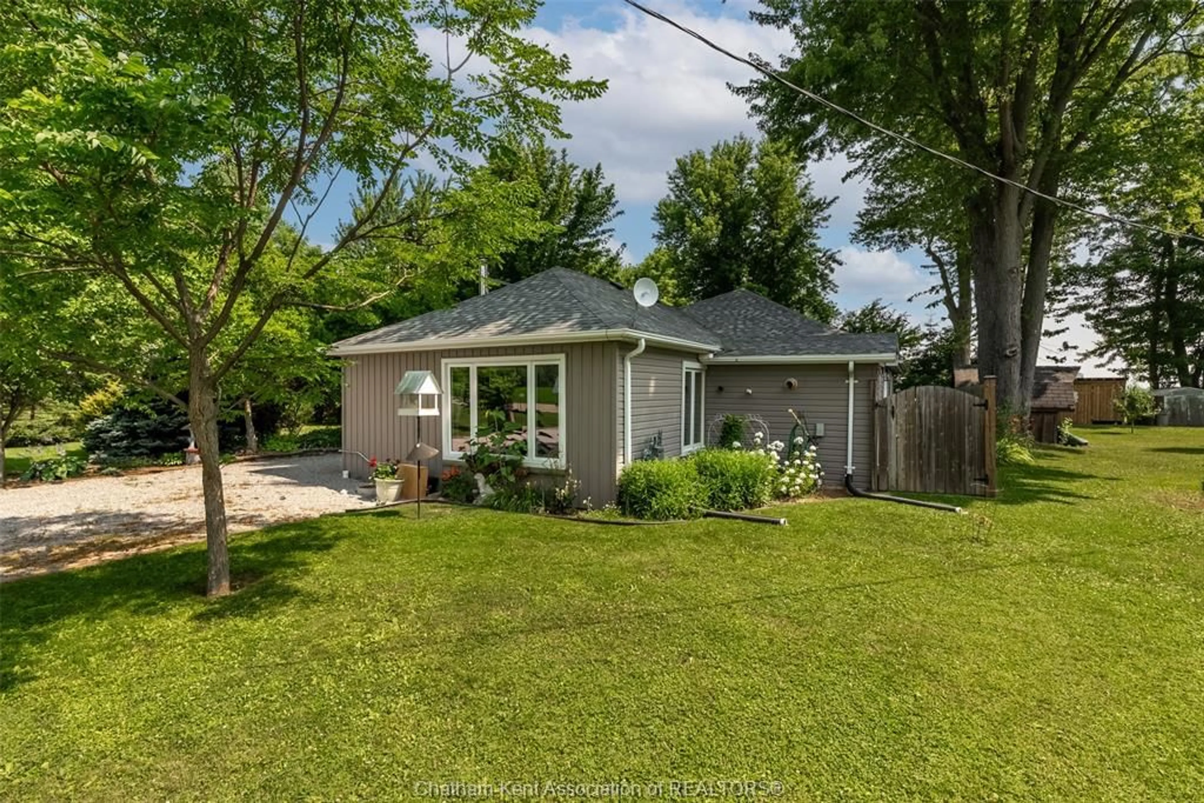 A pic from outside/outdoor area/front of a property/back of a property/a pic from drone, street for 22913 Harwich Rd, Chatham Ontario N7M 5J4