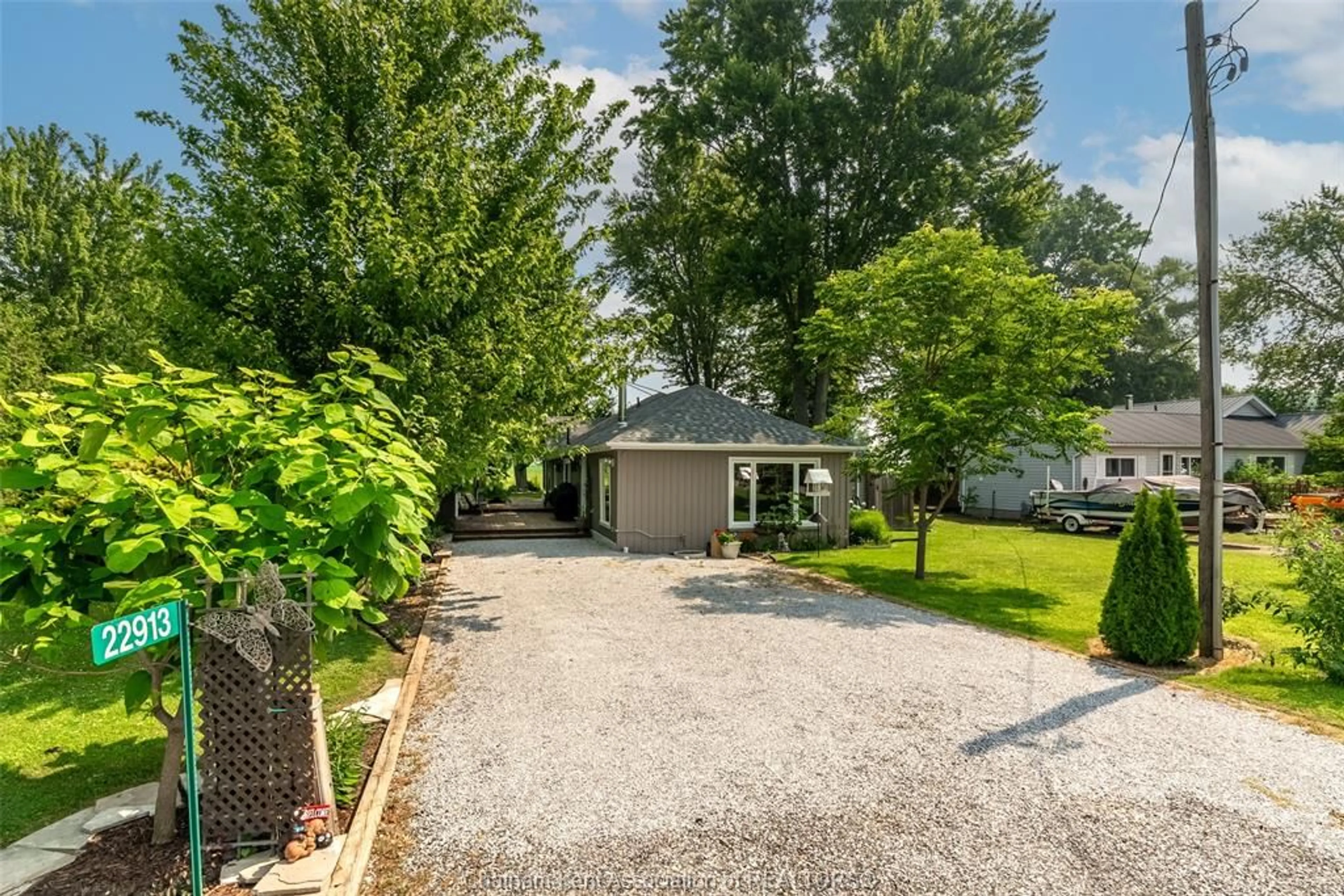 A pic from outside/outdoor area/front of a property/back of a property/a pic from drone, street for 22913 Harwich Rd, Chatham Ontario N7M 5J4