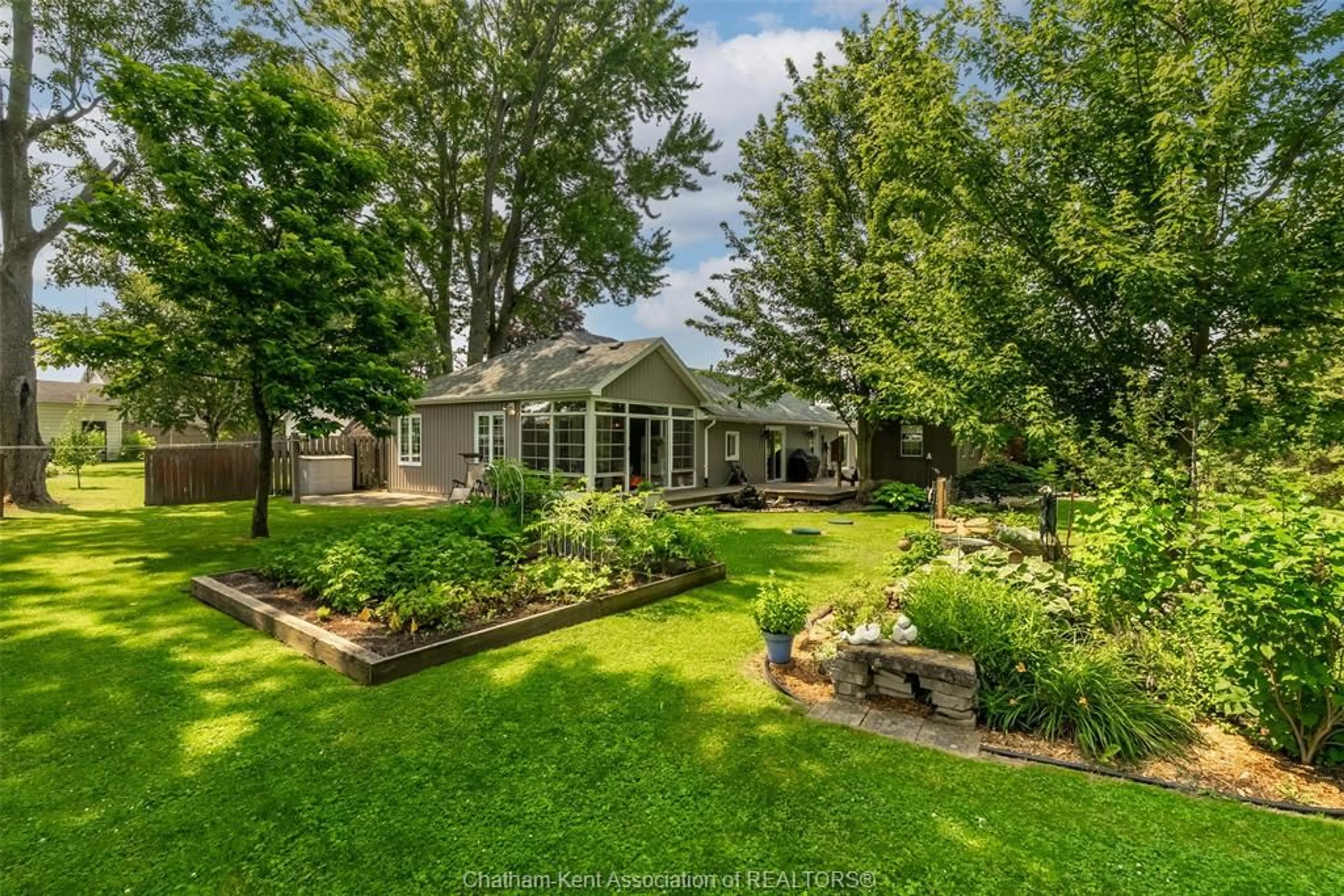 A pic from outside/outdoor area/front of a property/back of a property/a pic from drone, street for 22913 Harwich Rd, Chatham Ontario N7M 5J4