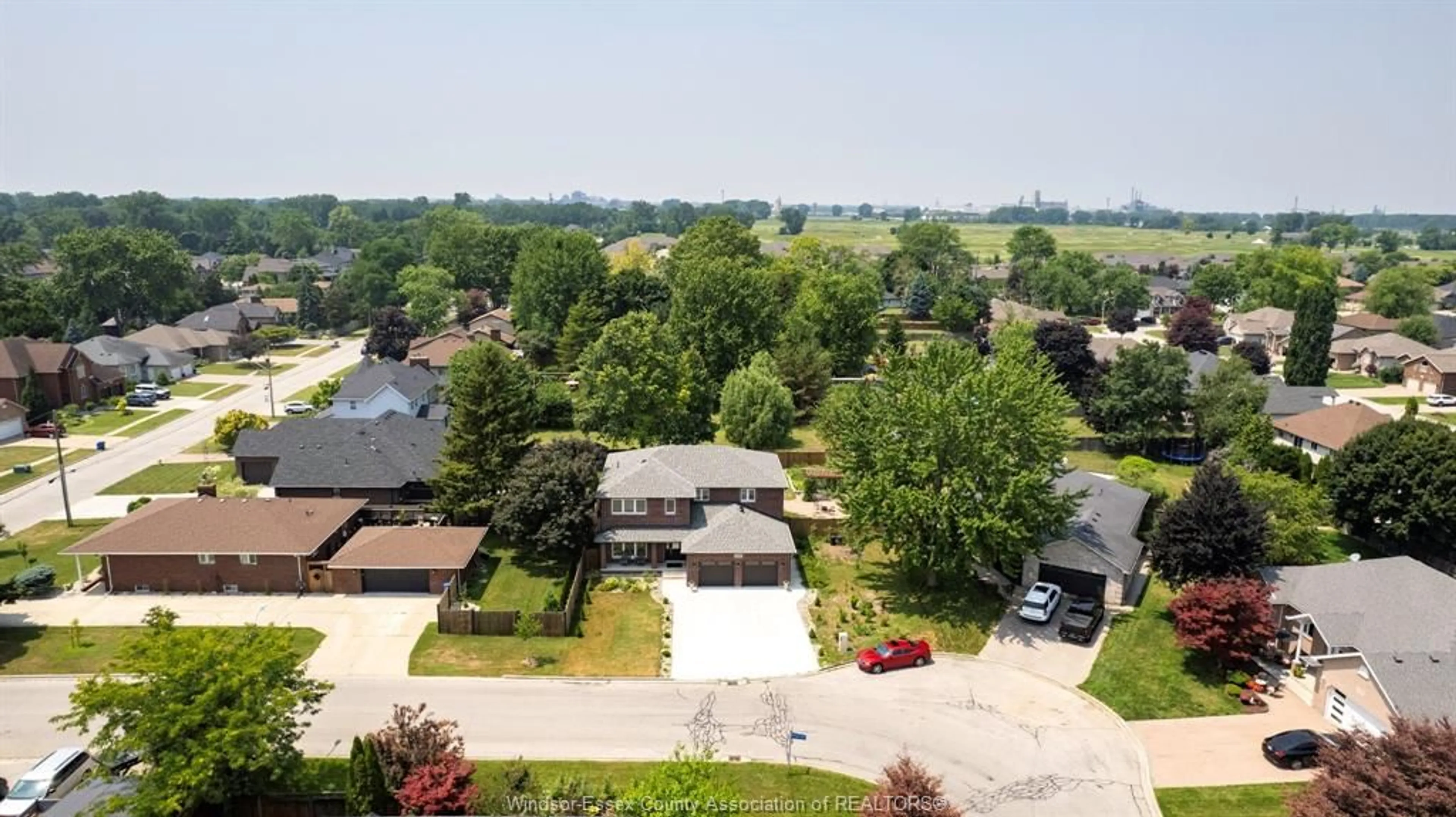 A pic from outside/outdoor area/front of a property/back of a property/a pic from drone, street for 1400 MONCK, LaSalle Ontario N9J 3P5