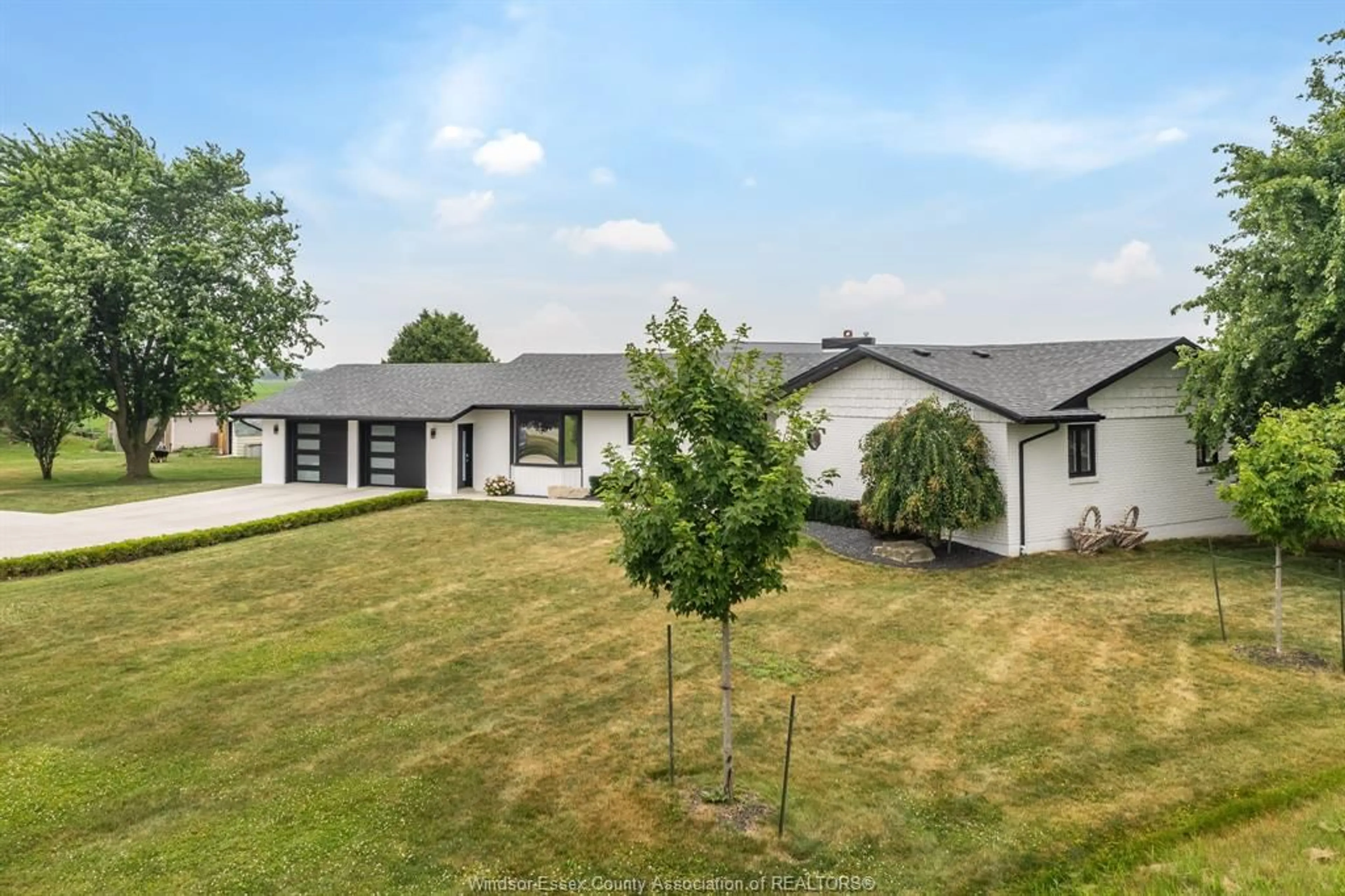 A pic from outside/outdoor area/front of a property/back of a property/a pic from drone, mountain view for 429 HIGHWAY 3 E, Leamington Ontario N8H 3V6