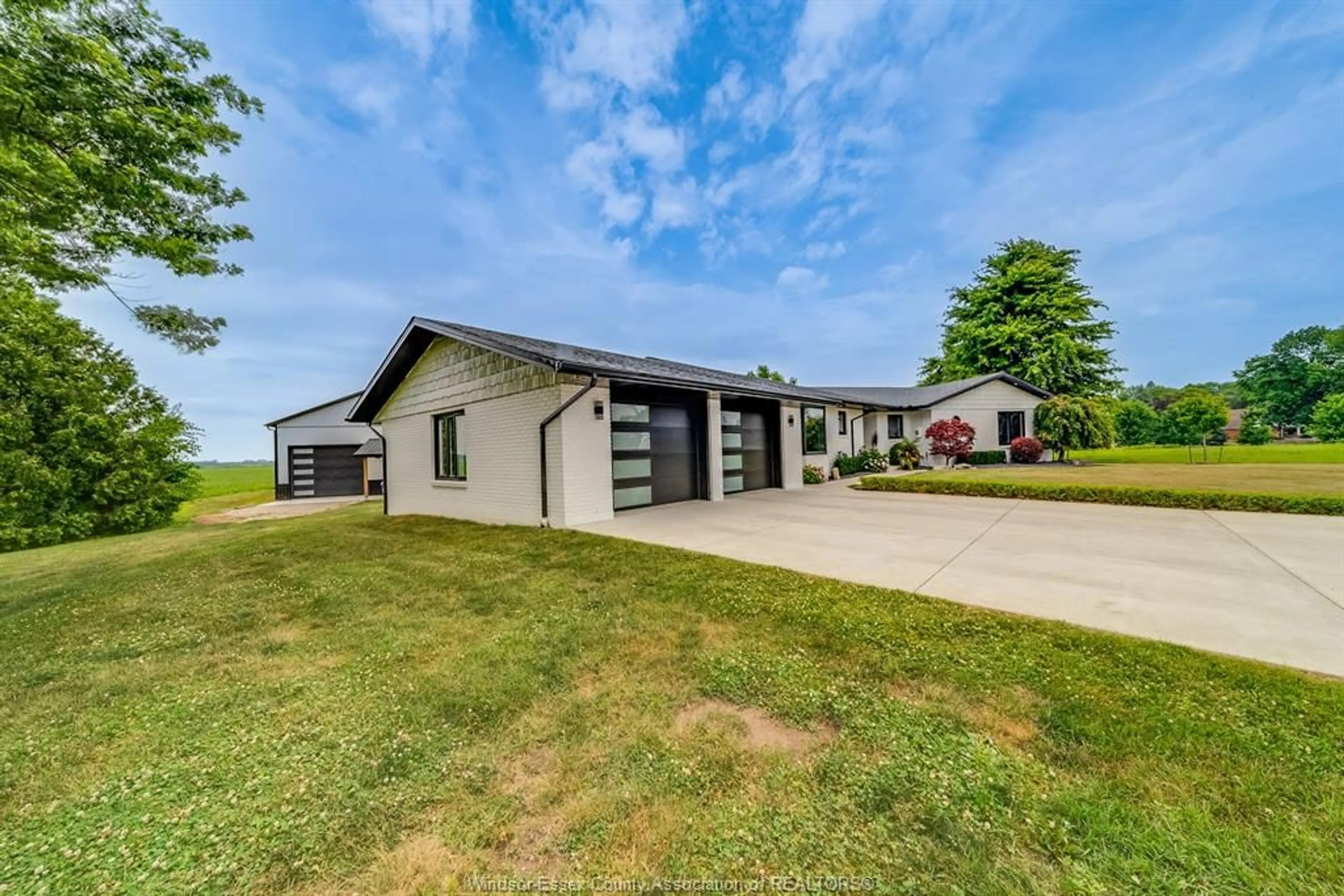A pic from outside/outdoor area/front of a property/back of a property/a pic from drone, unknown for 429 HIGHWAY 3 E, Leamington Ontario N8H 3V6
