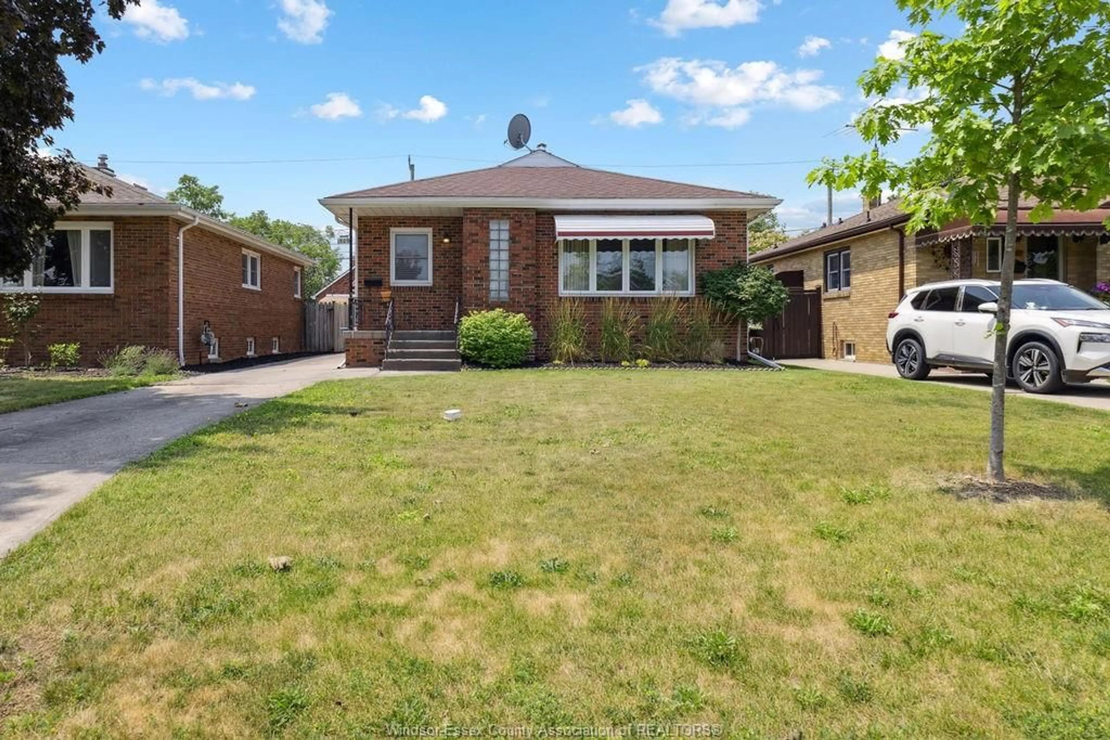 Home with brick exterior material, street for 1809 CHANDLER Rd, Windsor Ontario N8W 4A2
