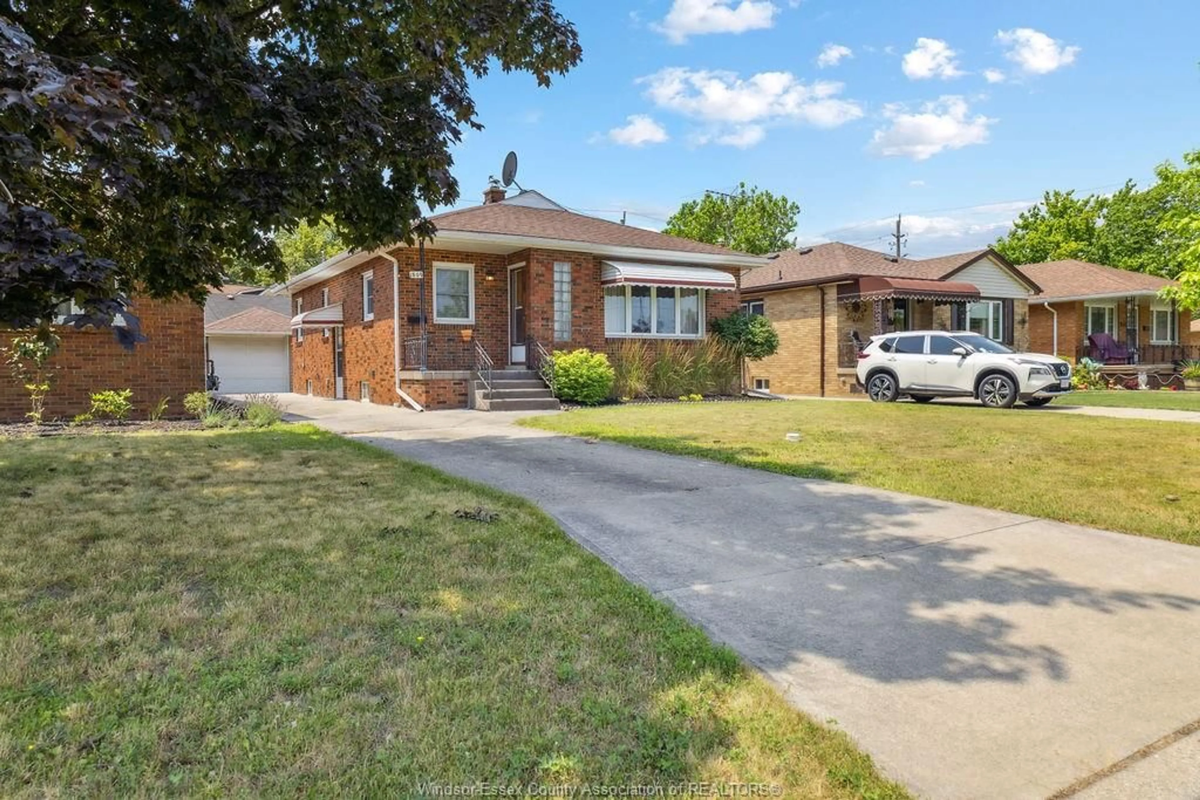 Home with brick exterior material, street for 1809 CHANDLER Rd, Windsor Ontario N8W 4A2