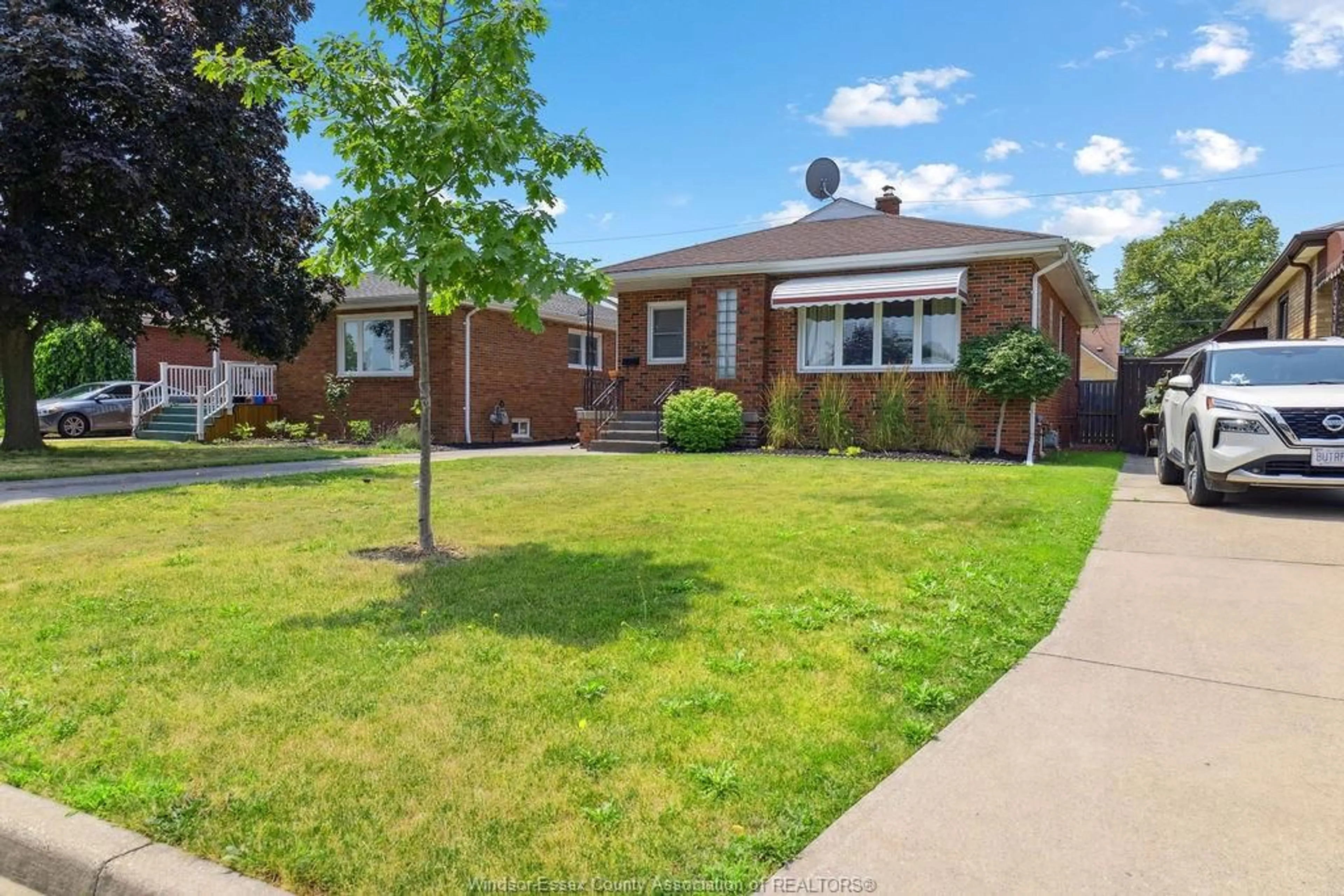 Home with brick exterior material, street for 1809 CHANDLER Rd, Windsor Ontario N8W 4A2