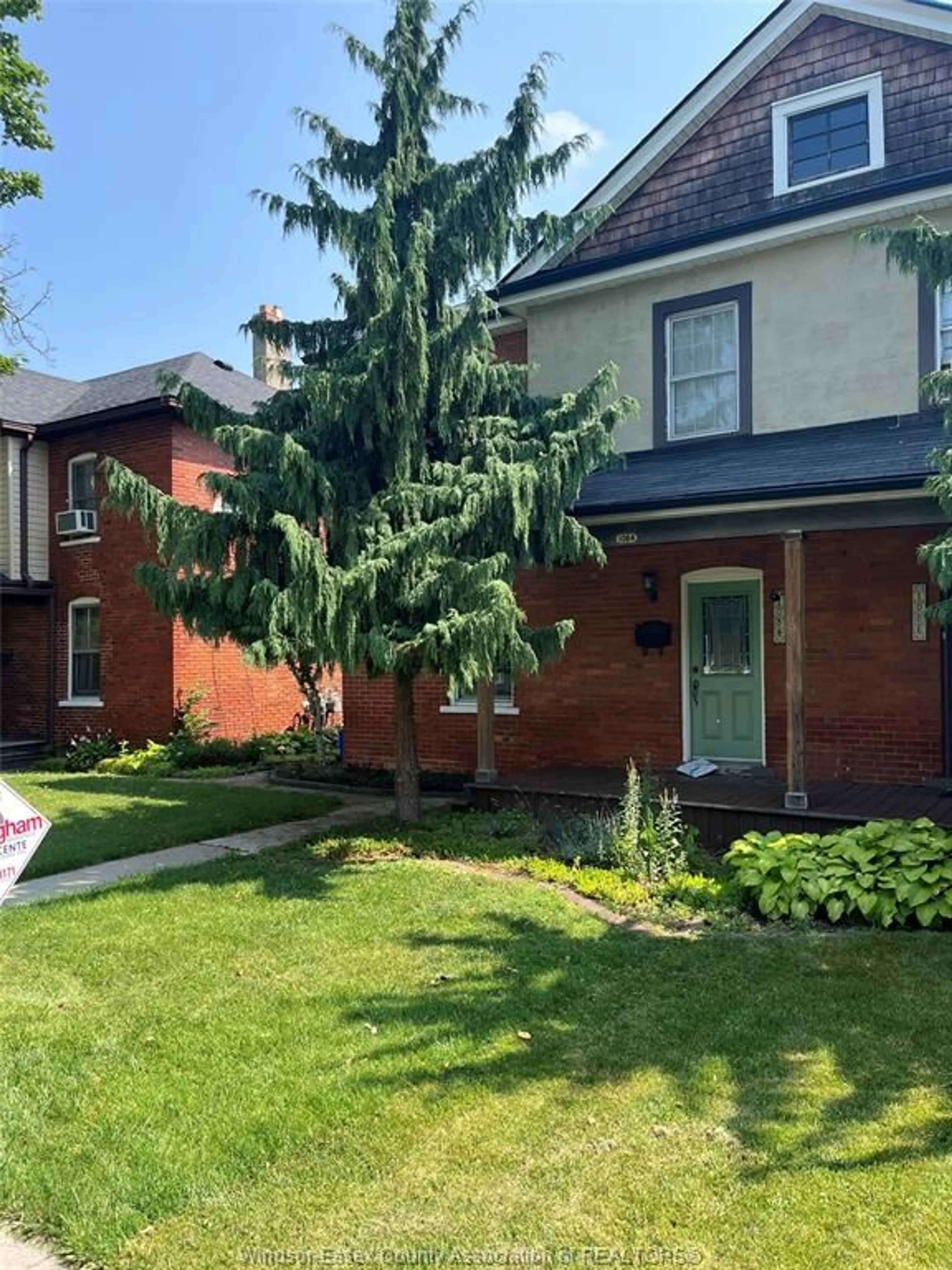 Home with brick exterior material, street for 1084 MONMOUTH, Windsor Ontario N8Y 3L7