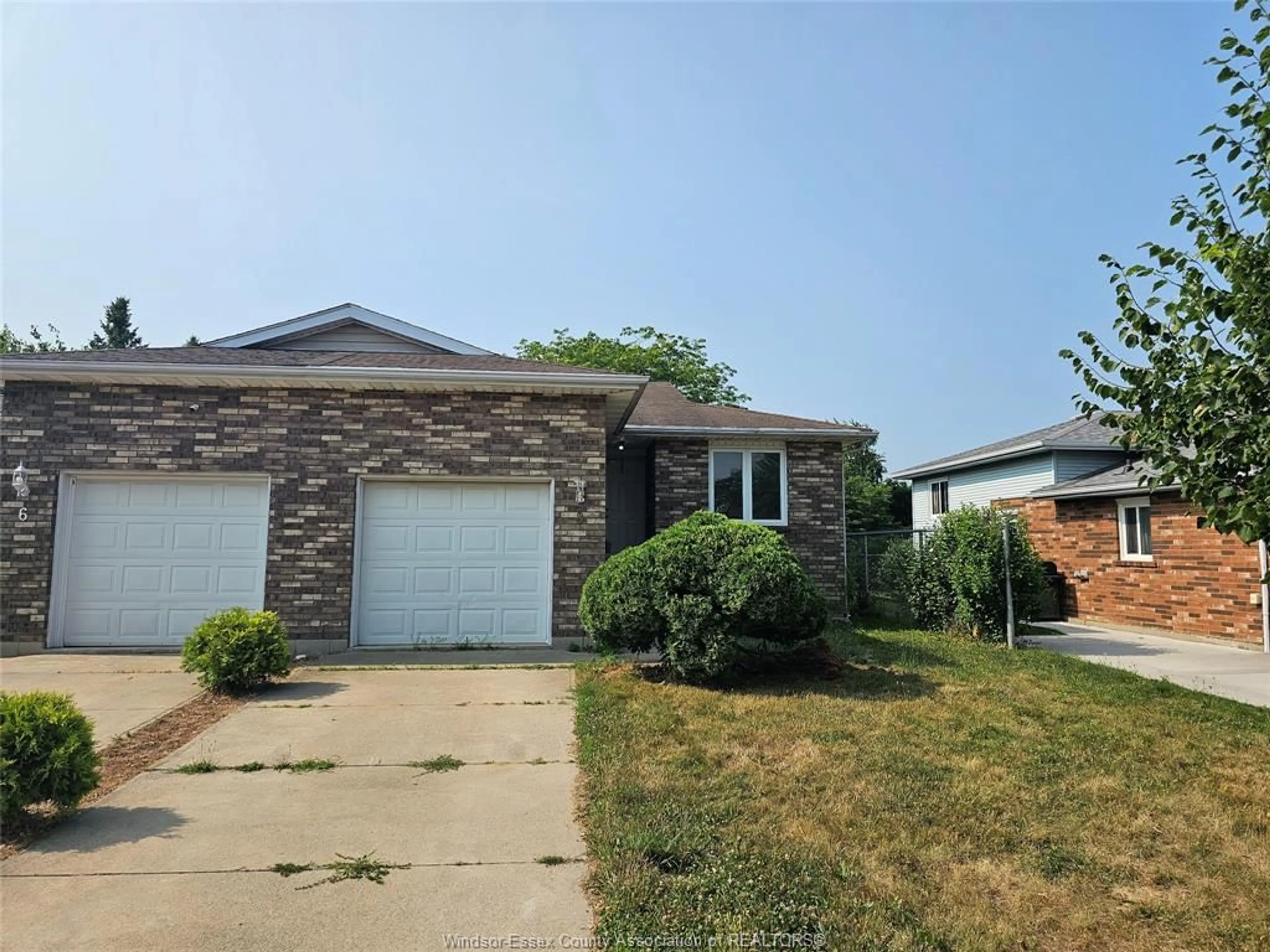 Home with vinyl exterior material, street for 8 EMERSON Ave, Leamington Ontario N8H 5B7