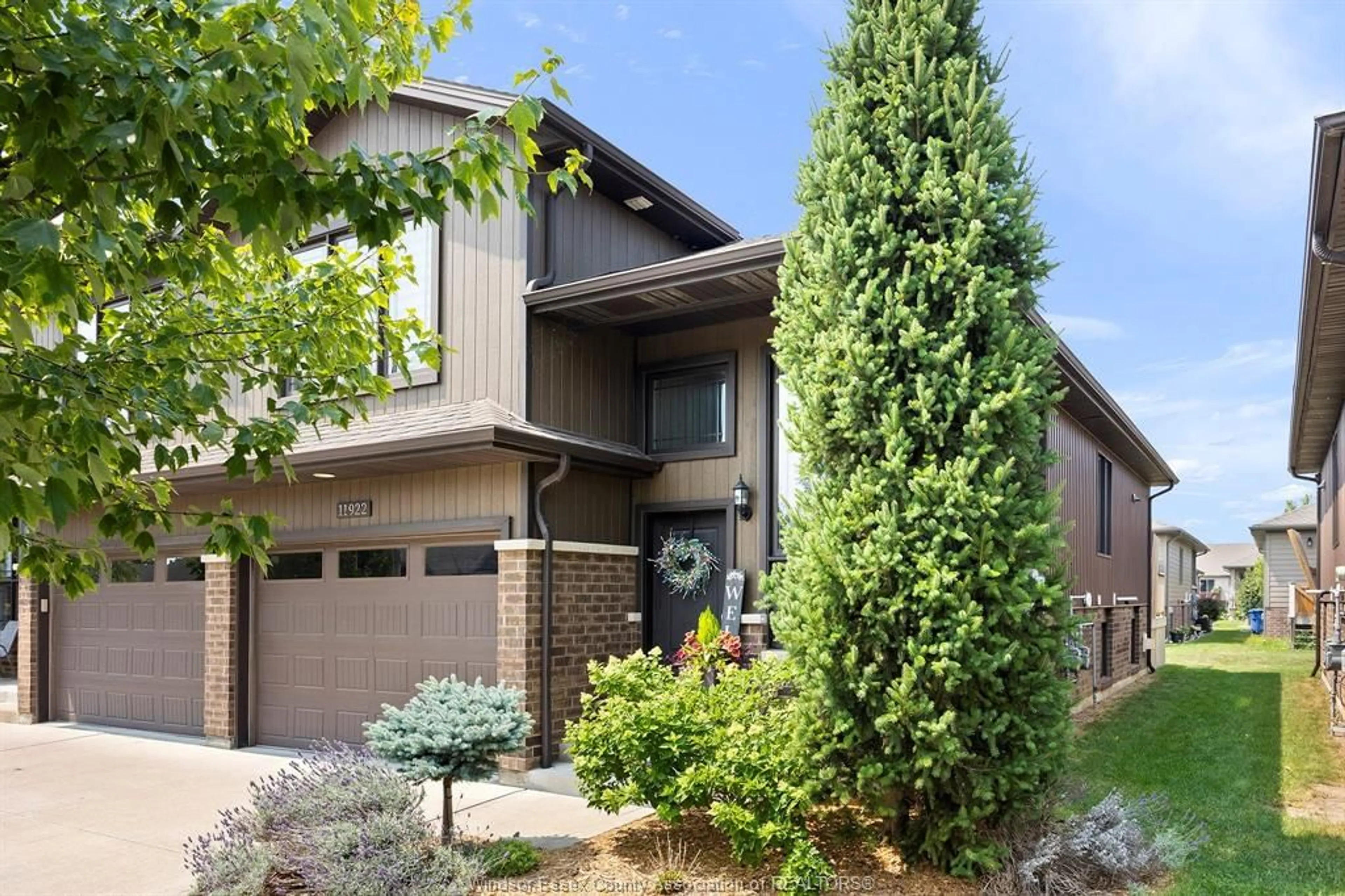 Home with brick exterior material, street for 11922 THISTLEDOWN Ave, Windsor Ontario N8P 0B6