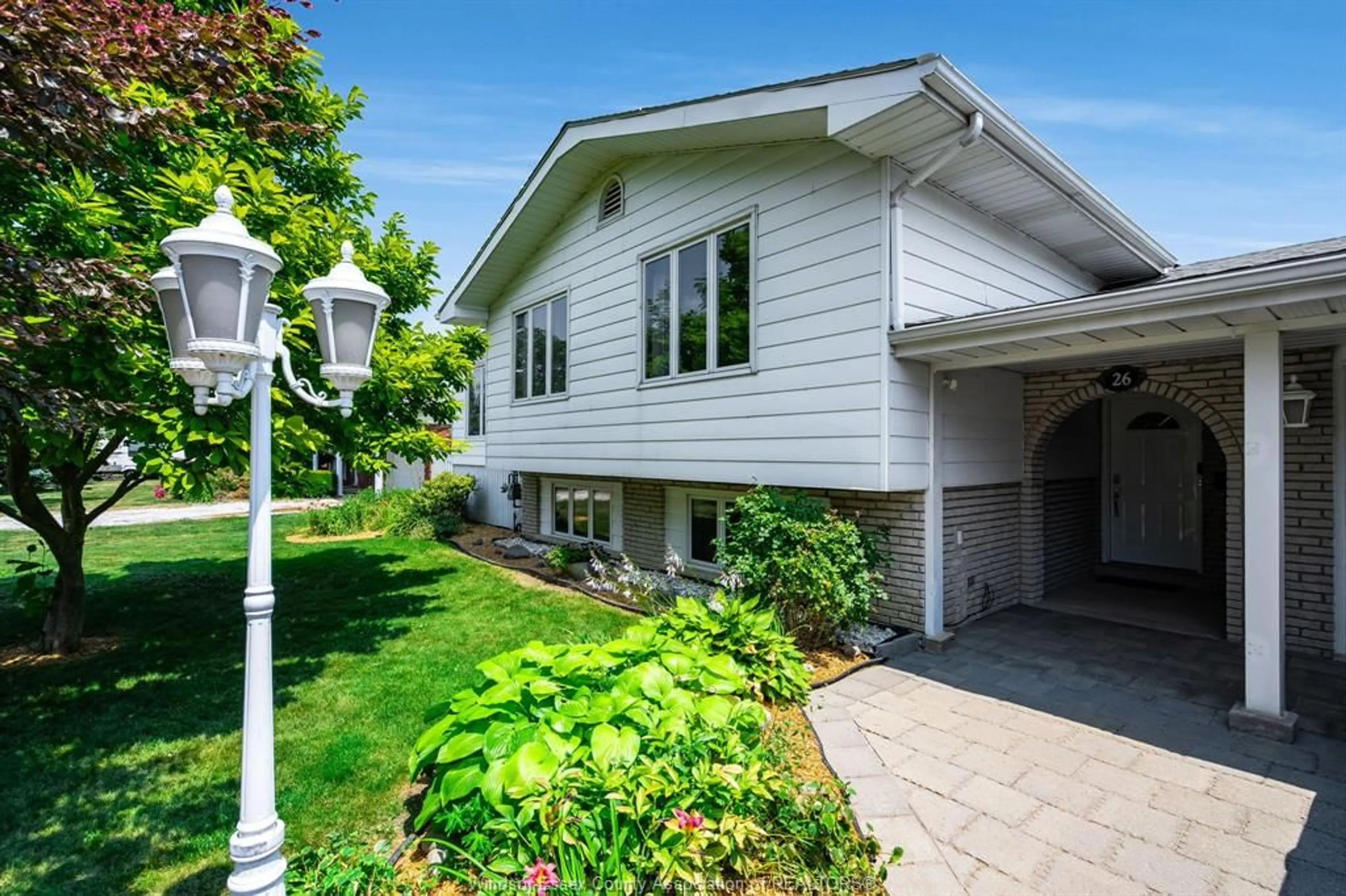 Home with vinyl exterior material, street for 26 LAWSON STREET, Tilbury Ontario N0P 2L0