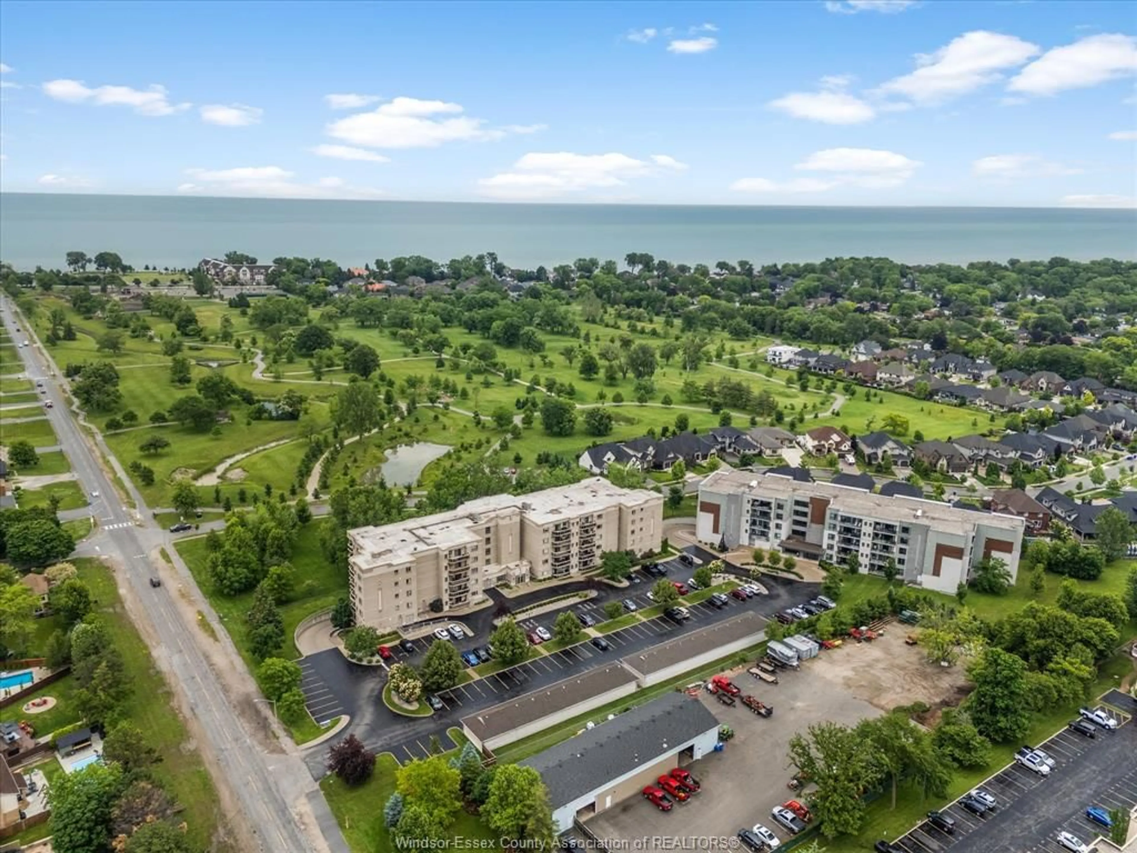 A pic from outside/outdoor area/front of a property/back of a property/a pic from drone, water/lake/river/ocean view for 250 Manning Rd #204, Tecumseh Ontario N8H 0A8