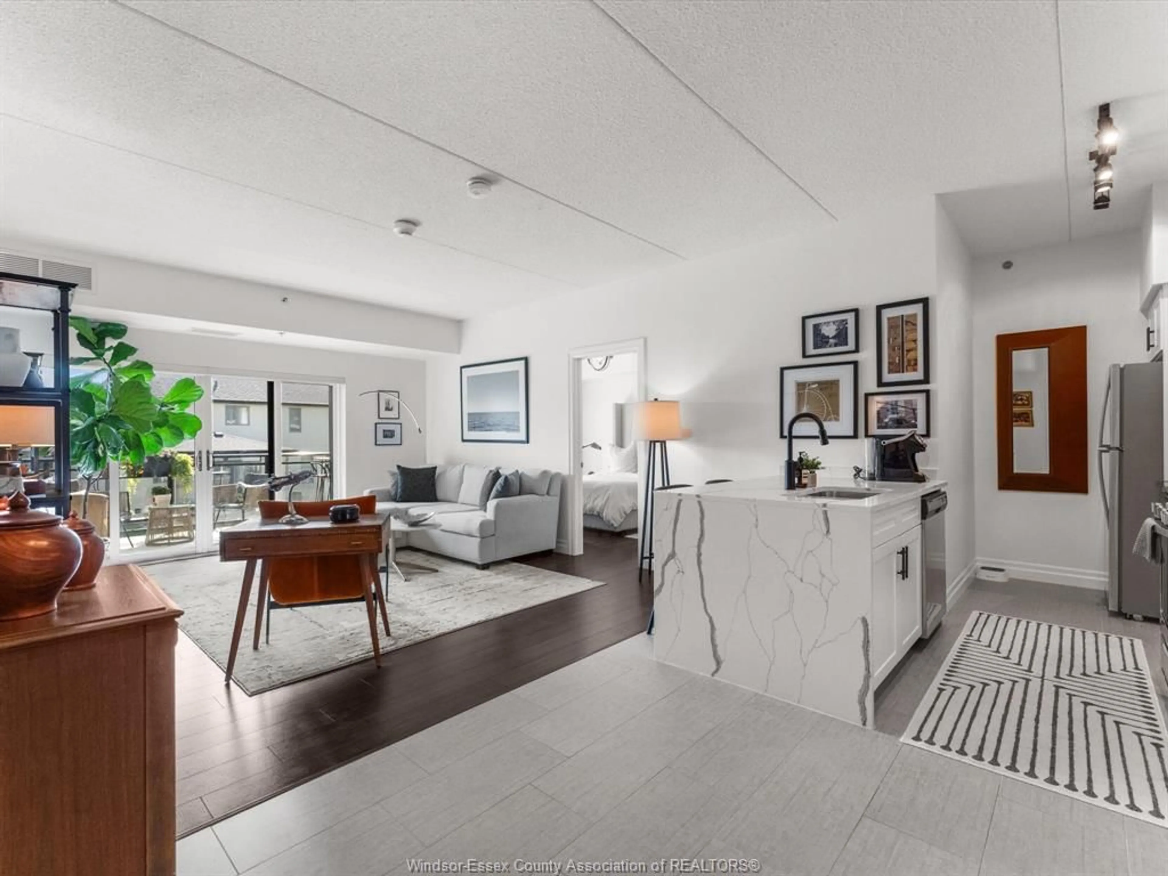Living room with furniture, unknown for 250 Manning Rd #204, Tecumseh Ontario N8H 0A8
