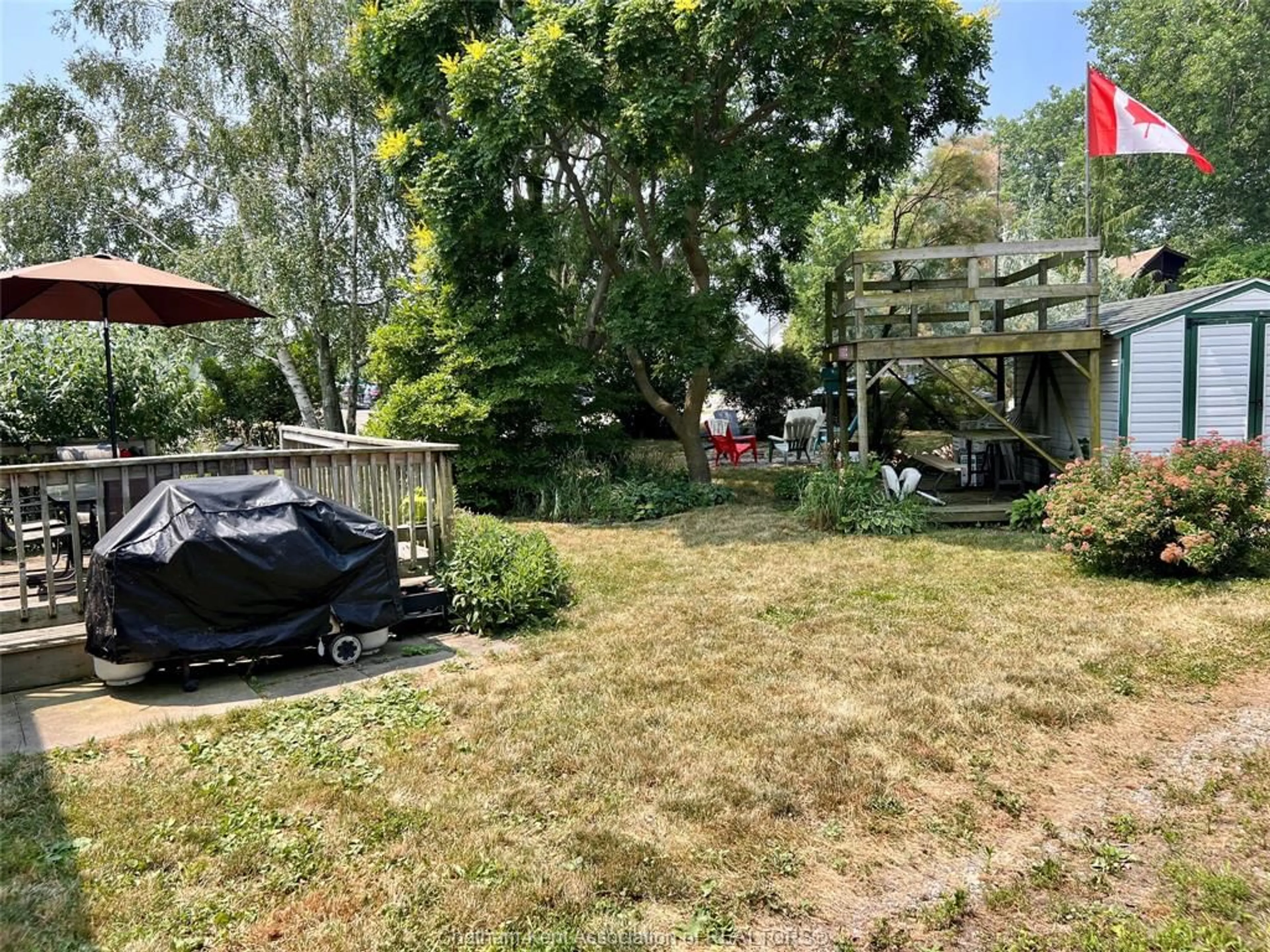 A pic from outside/outdoor area/front of a property/back of a property/a pic from drone, street for 1520 Kerr Ave, Erieau Ontario N0P 1N0