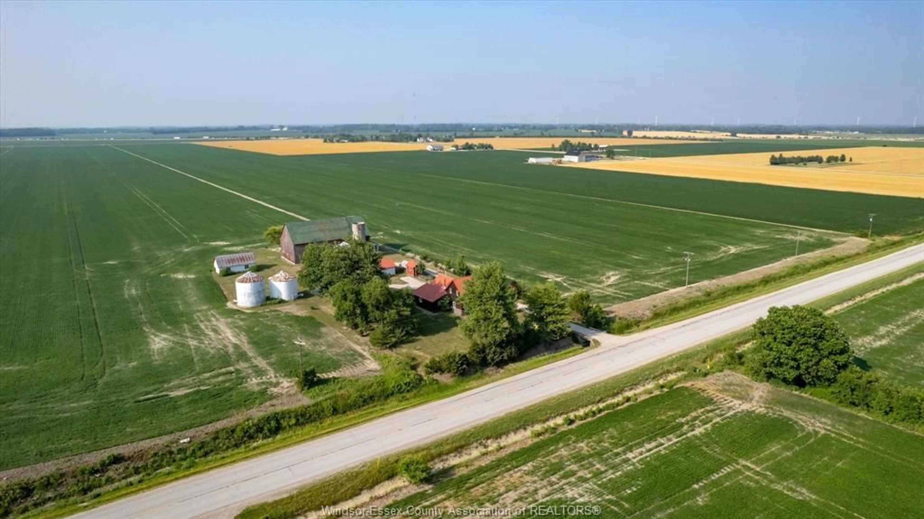 A pic from outside/outdoor area/front of a property/back of a property/a pic from drone, building for 130 COUNTY RD 27, Kingsville Ontario N8M 2X5