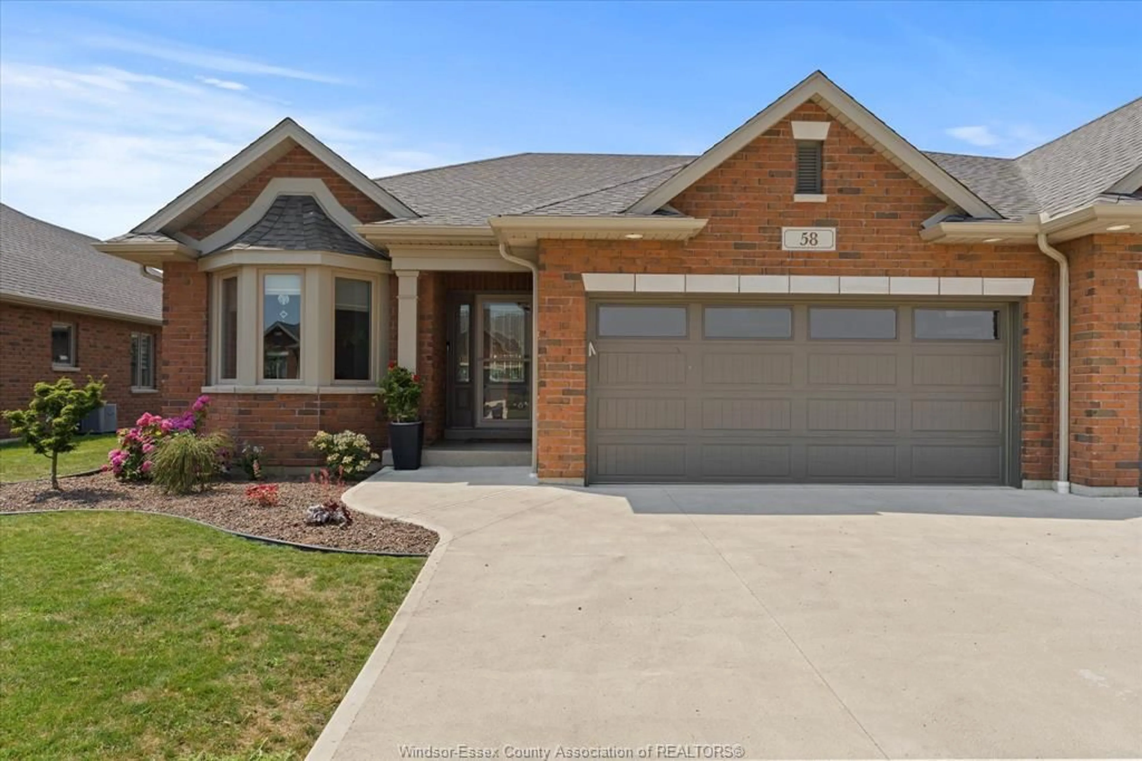 Home with brick exterior material, street for 58 YORK Blvd, Kingsville Ontario N9Y 0G3