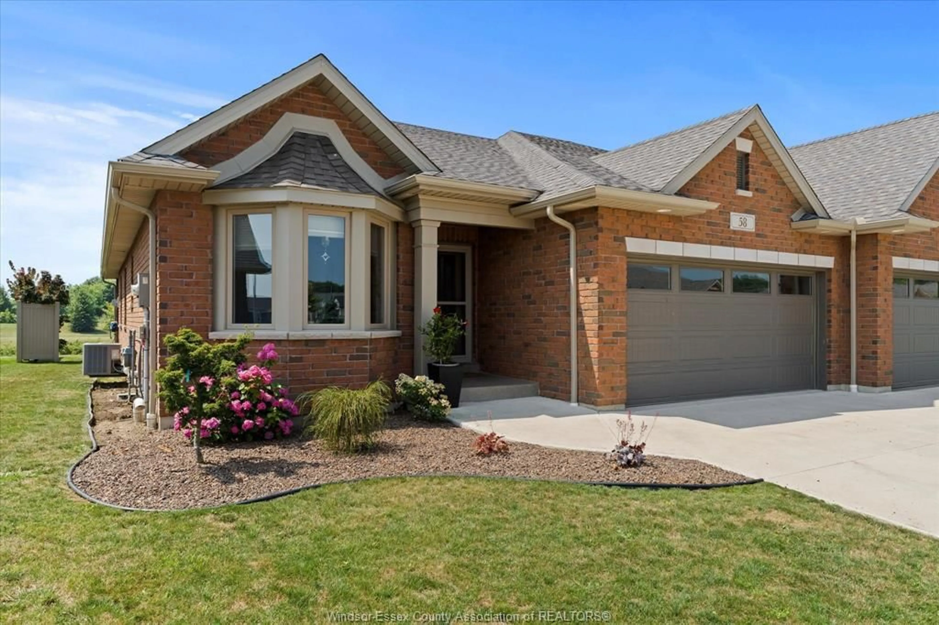 Home with brick exterior material, street for 58 YORK Blvd, Kingsville Ontario N9Y 0G3