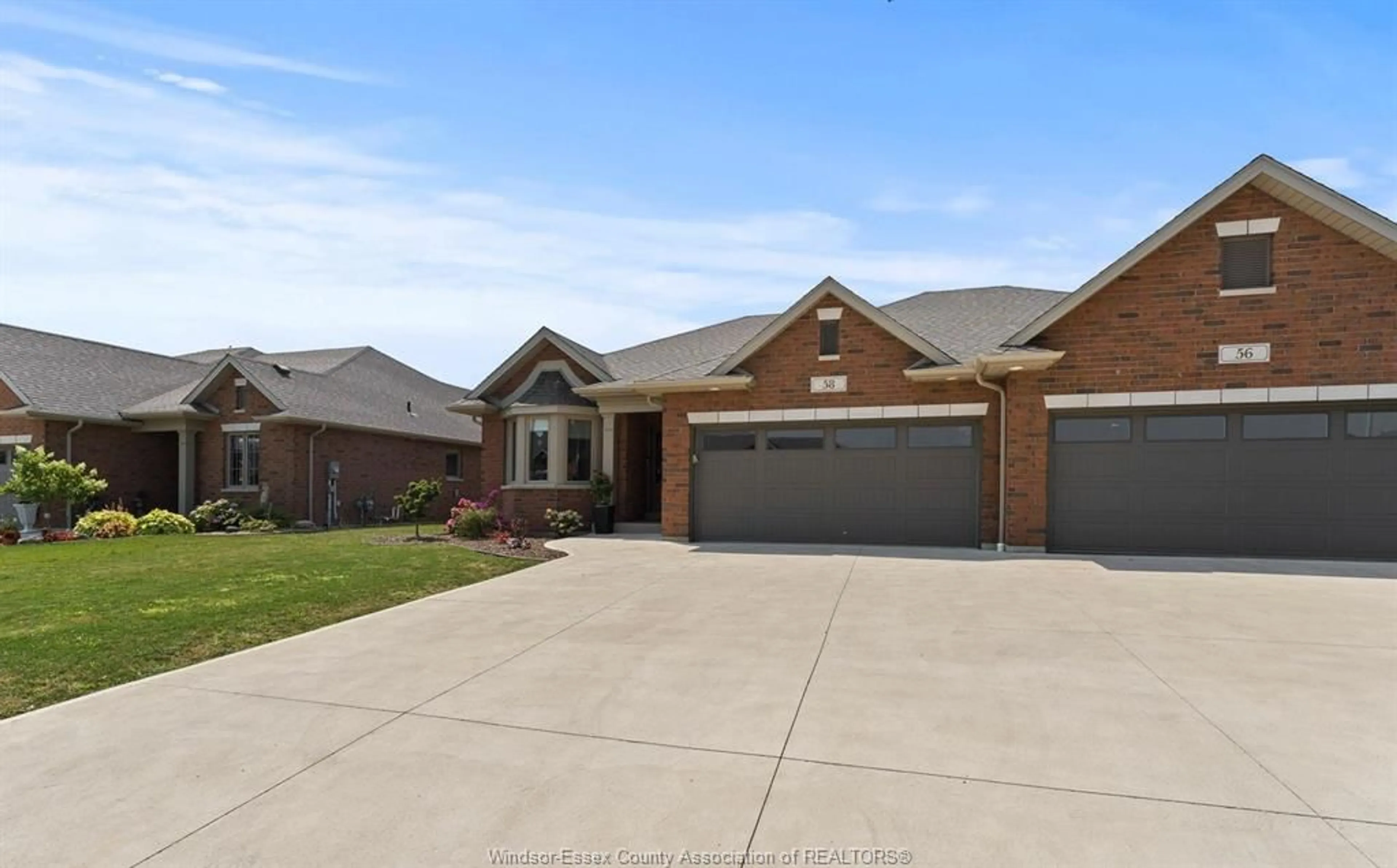 Home with brick exterior material, street for 58 YORK Blvd, Kingsville Ontario N9Y 0G3