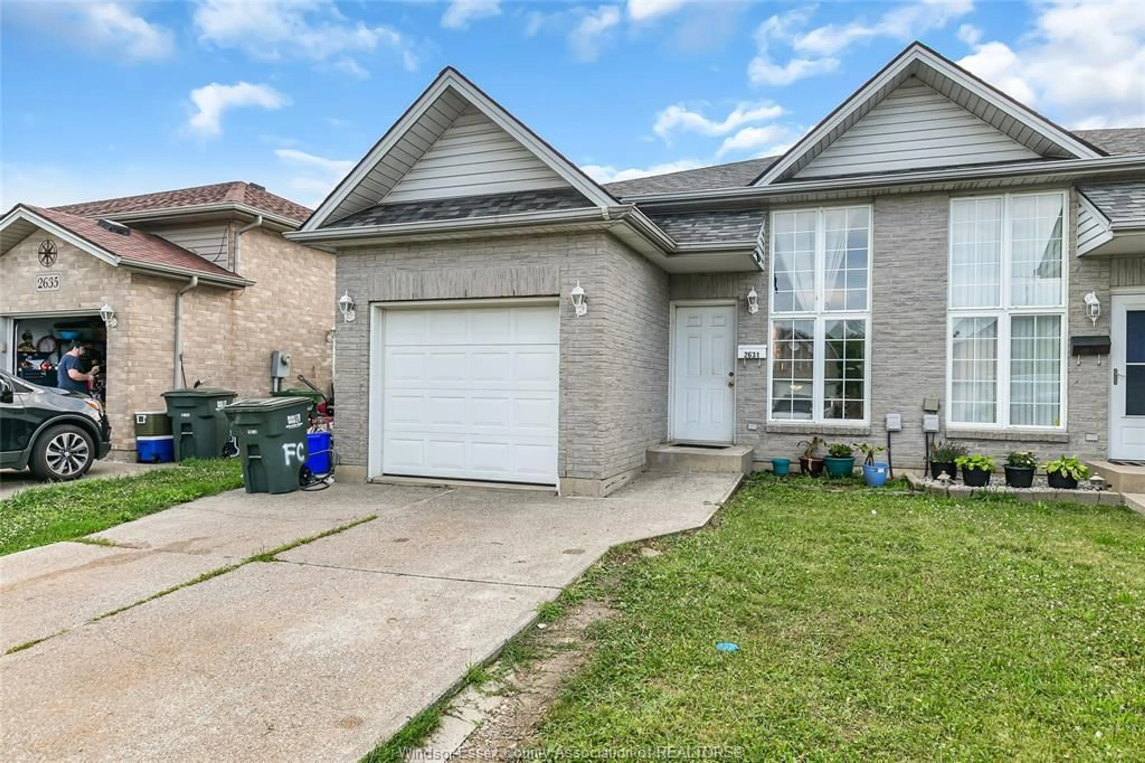 Home with brick exterior material, street for 2631 TEEDIE Cres, Windsor Ontario N8R 2K5