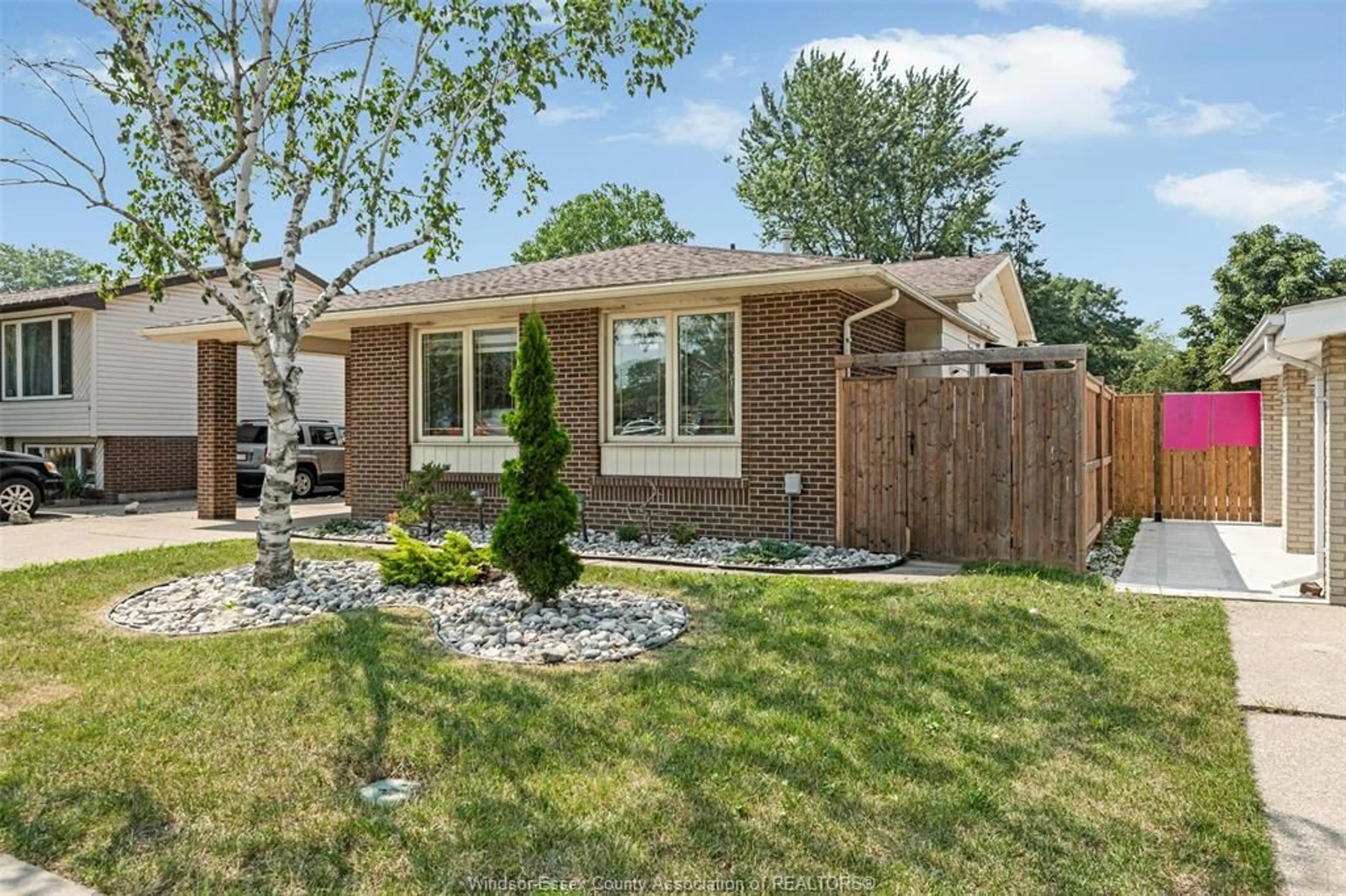Home with brick exterior material, street for 2933 WILDWOOD Dr, Windsor Ontario N8R 1T9