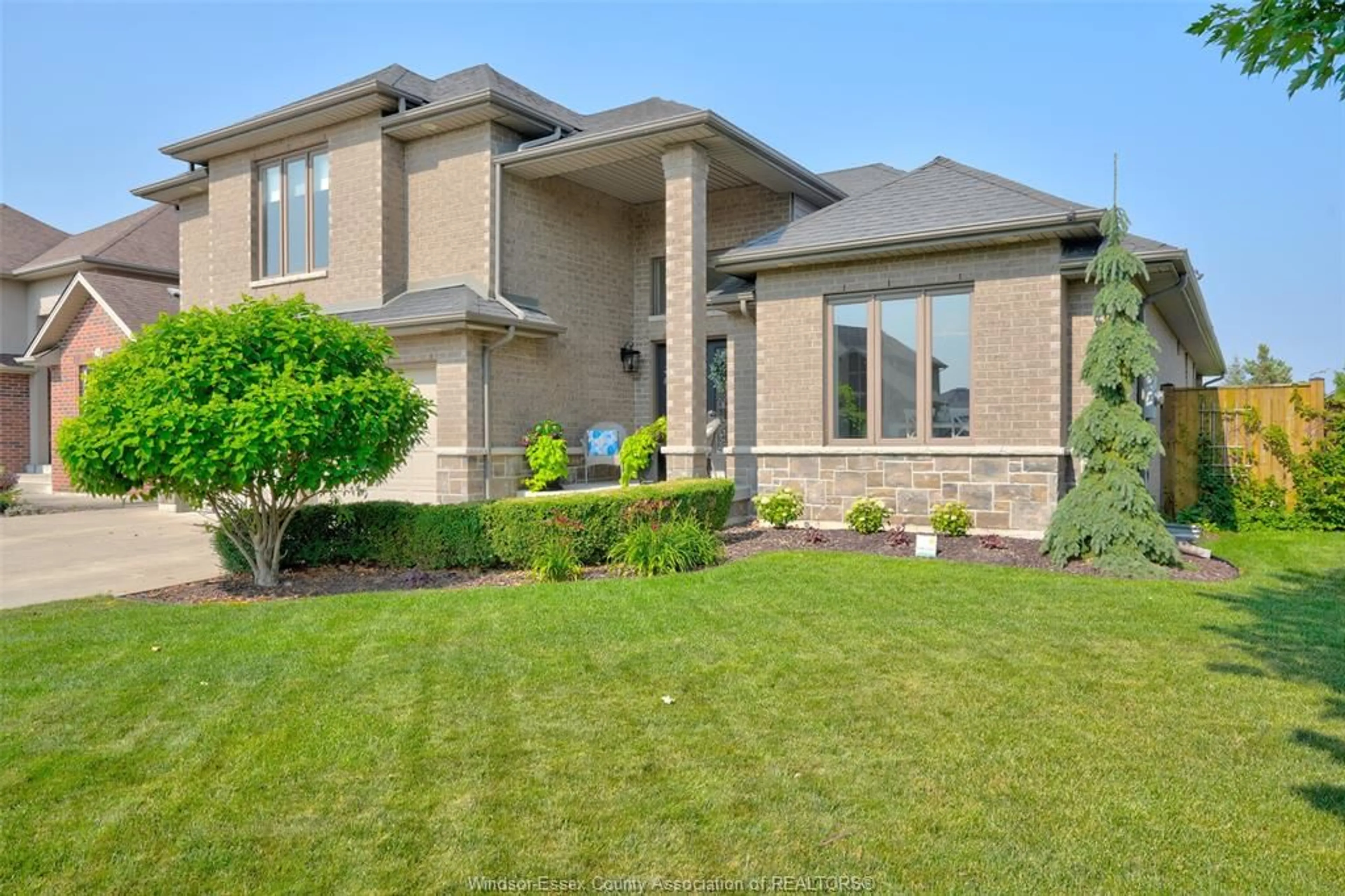 Home with brick exterior material, street for 1273 DEER RUN Trail, Lakeshore Ontario N8L 0S8