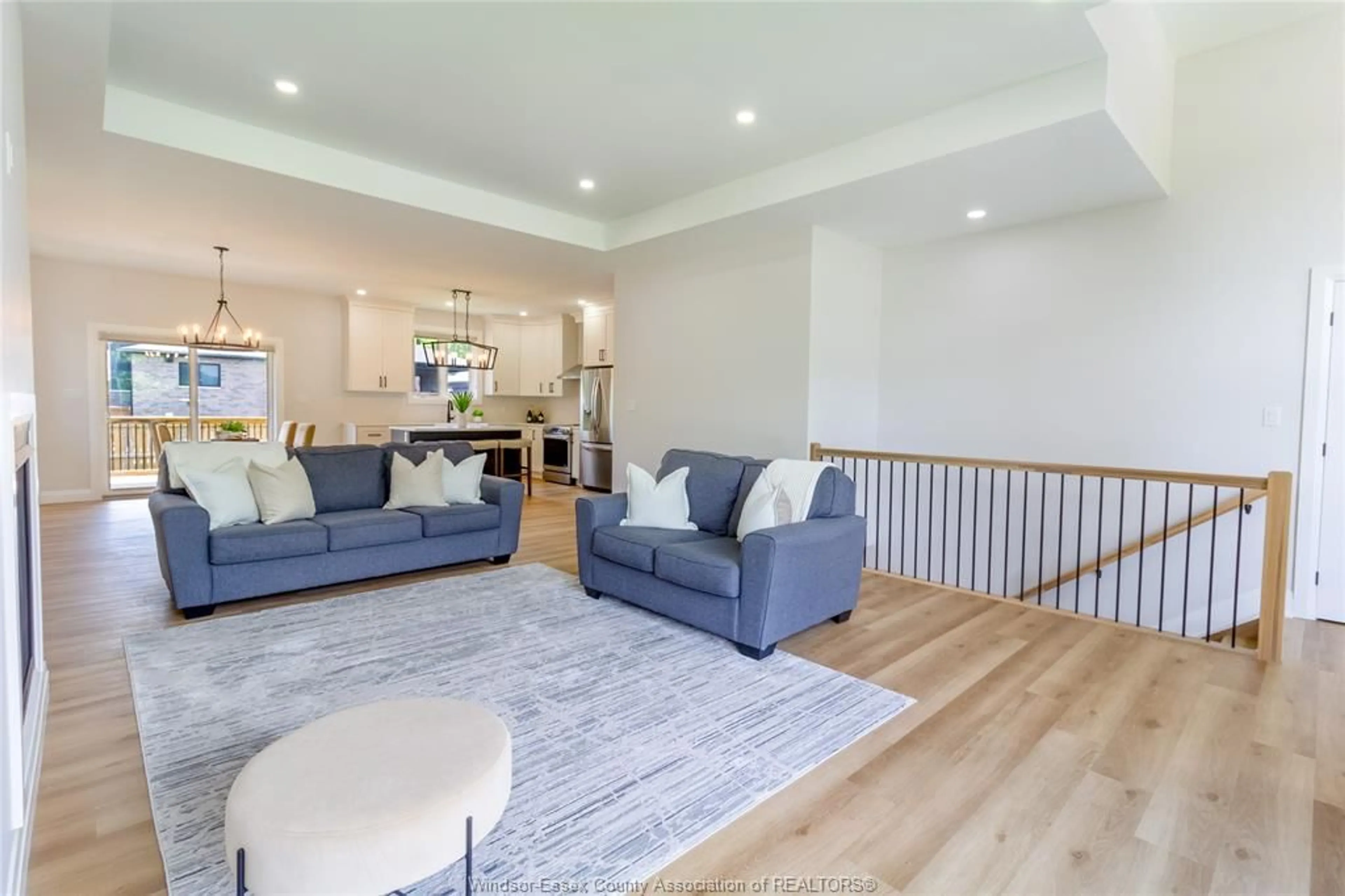 Living room with furniture, wood/laminate floor for 237 SANDYBROOK Way, Kingsville Ontario N9Y 0A3