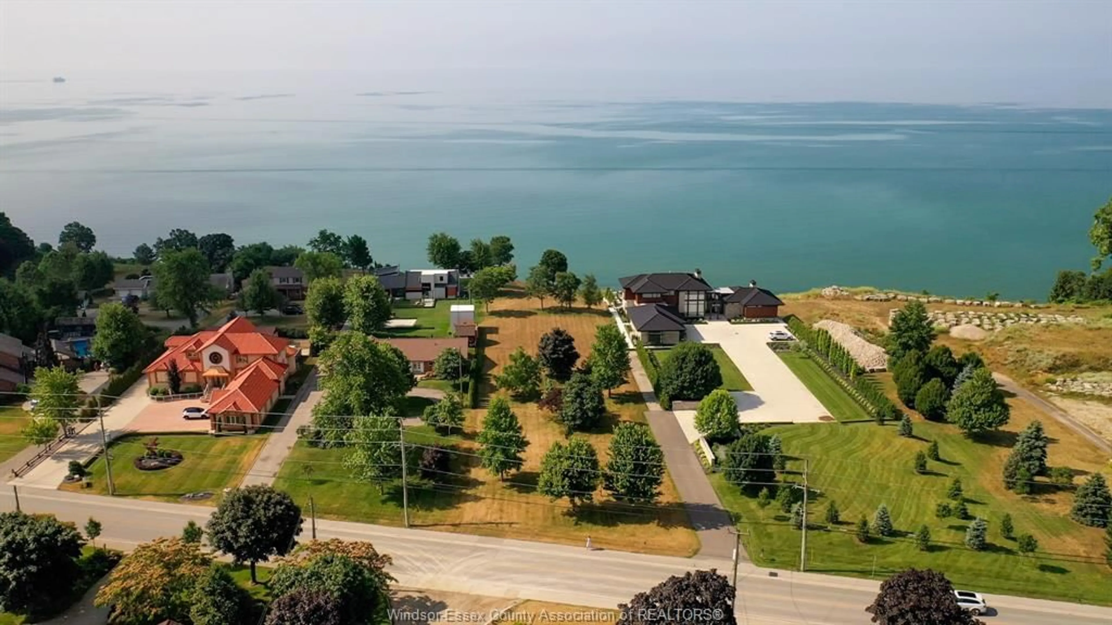 A pic from outside/outdoor area/front of a property/back of a property/a pic from drone, water/lake/river/ocean view for 366 SEACLIFF Dr, Leamington Ontario N8H 4E1