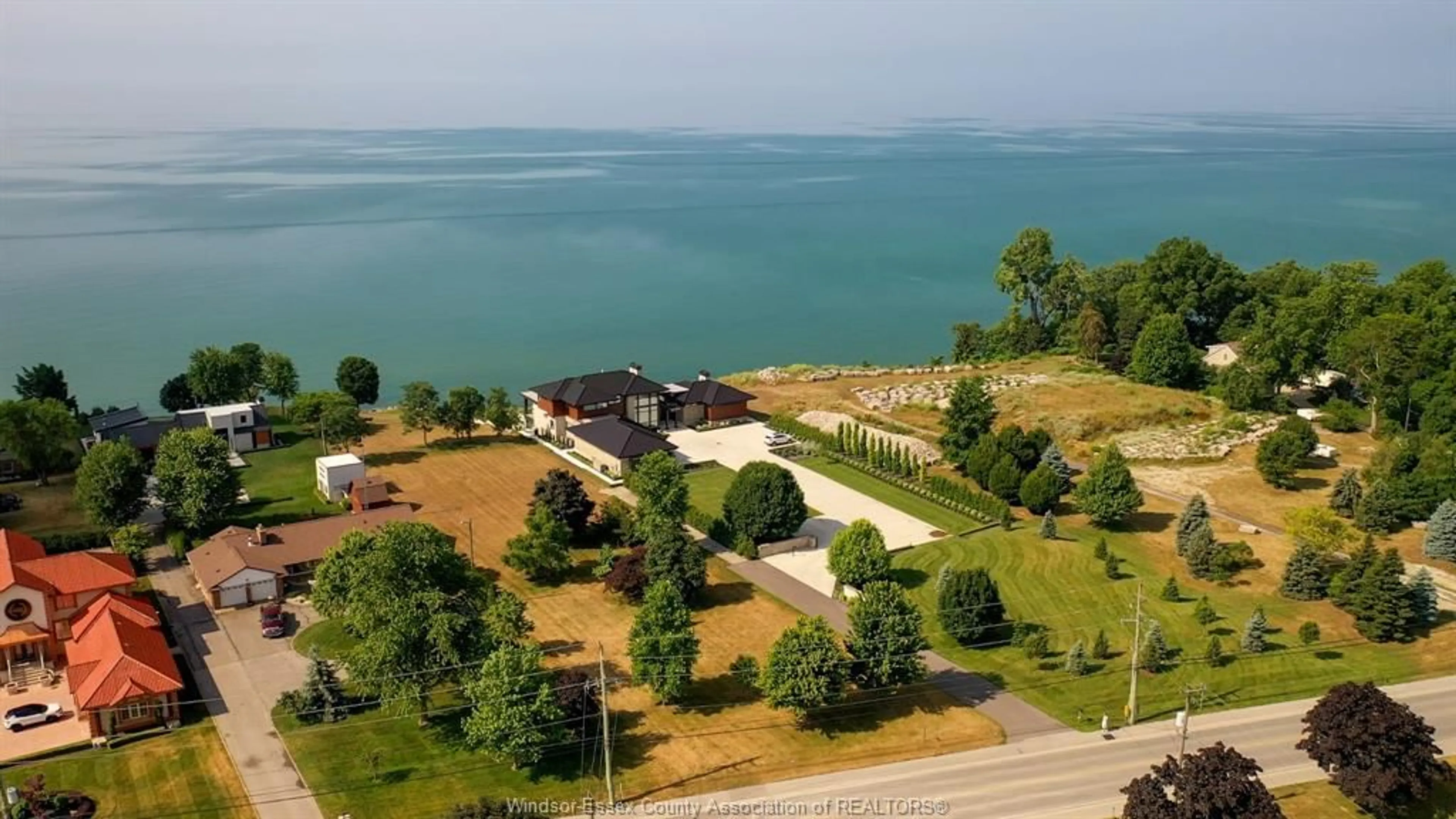 A pic from outside/outdoor area/front of a property/back of a property/a pic from drone, water/lake/river/ocean view for 366 SEACLIFF Dr, Leamington Ontario N8H 4E1