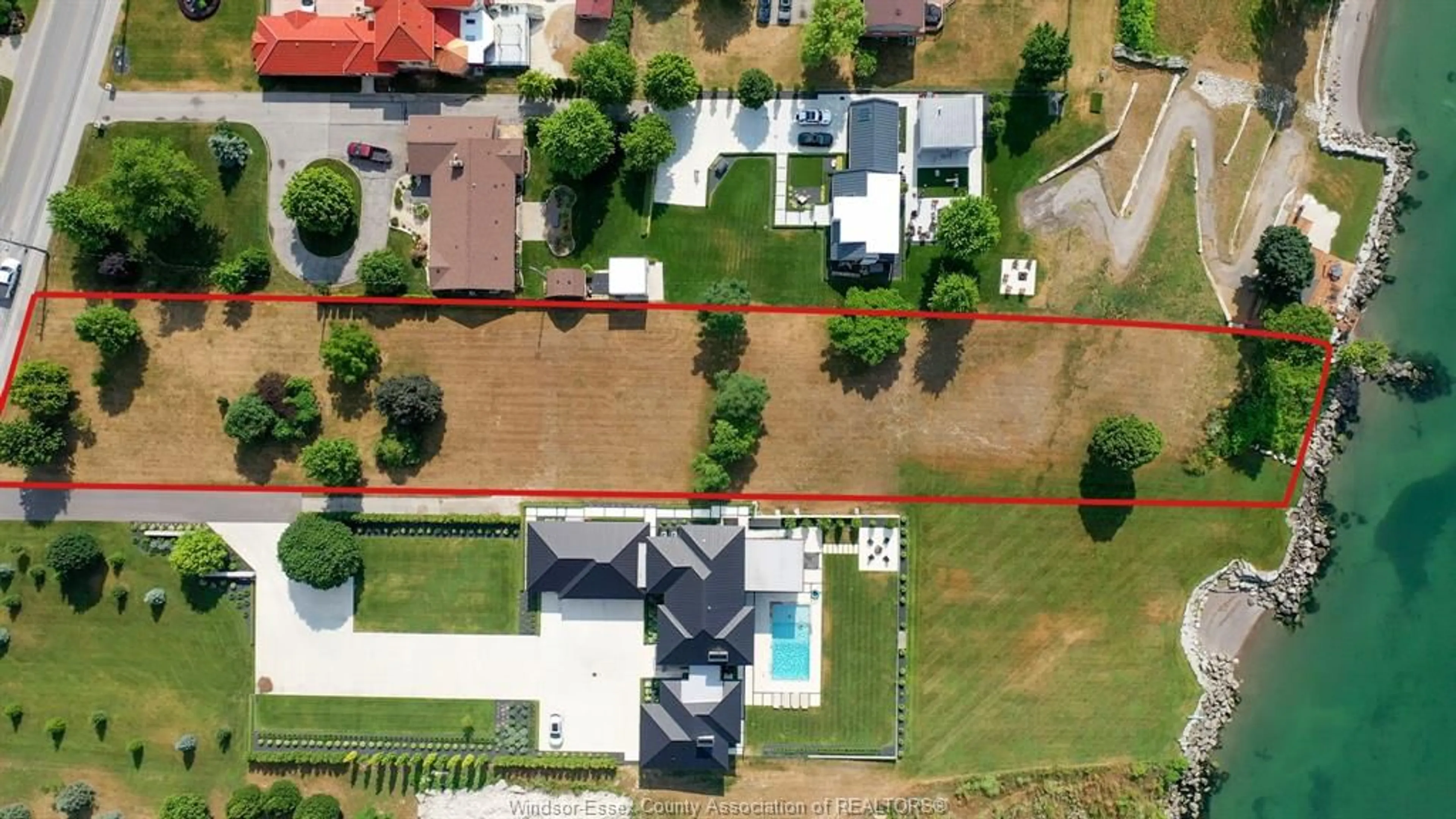 A pic from outside/outdoor area/front of a property/back of a property/a pic from drone, street for 366 SEACLIFF Dr, Leamington Ontario N8H 4E1