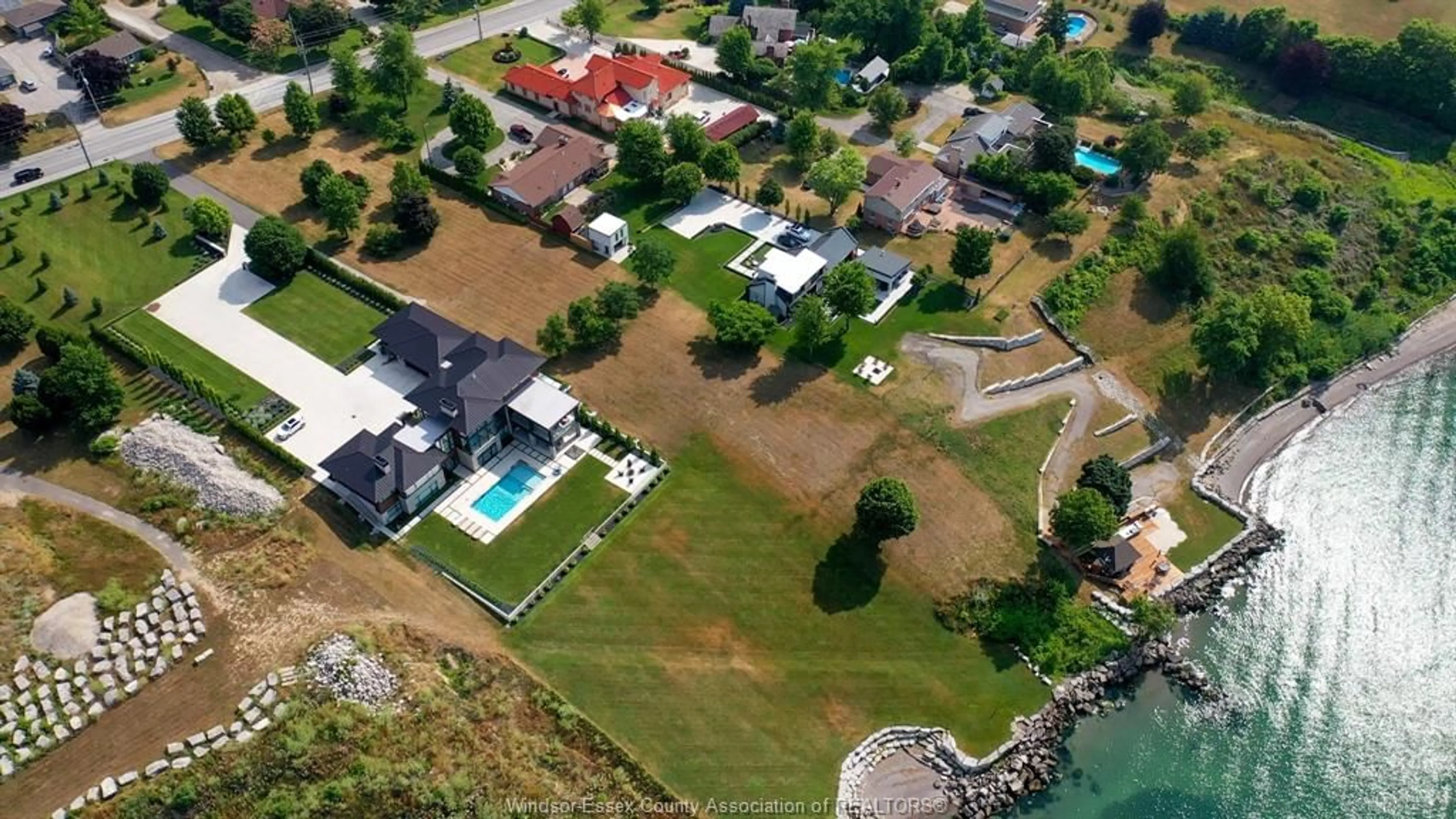 A pic from outside/outdoor area/front of a property/back of a property/a pic from drone, water/lake/river/ocean view for 366 SEACLIFF Dr, Leamington Ontario N8H 4E1