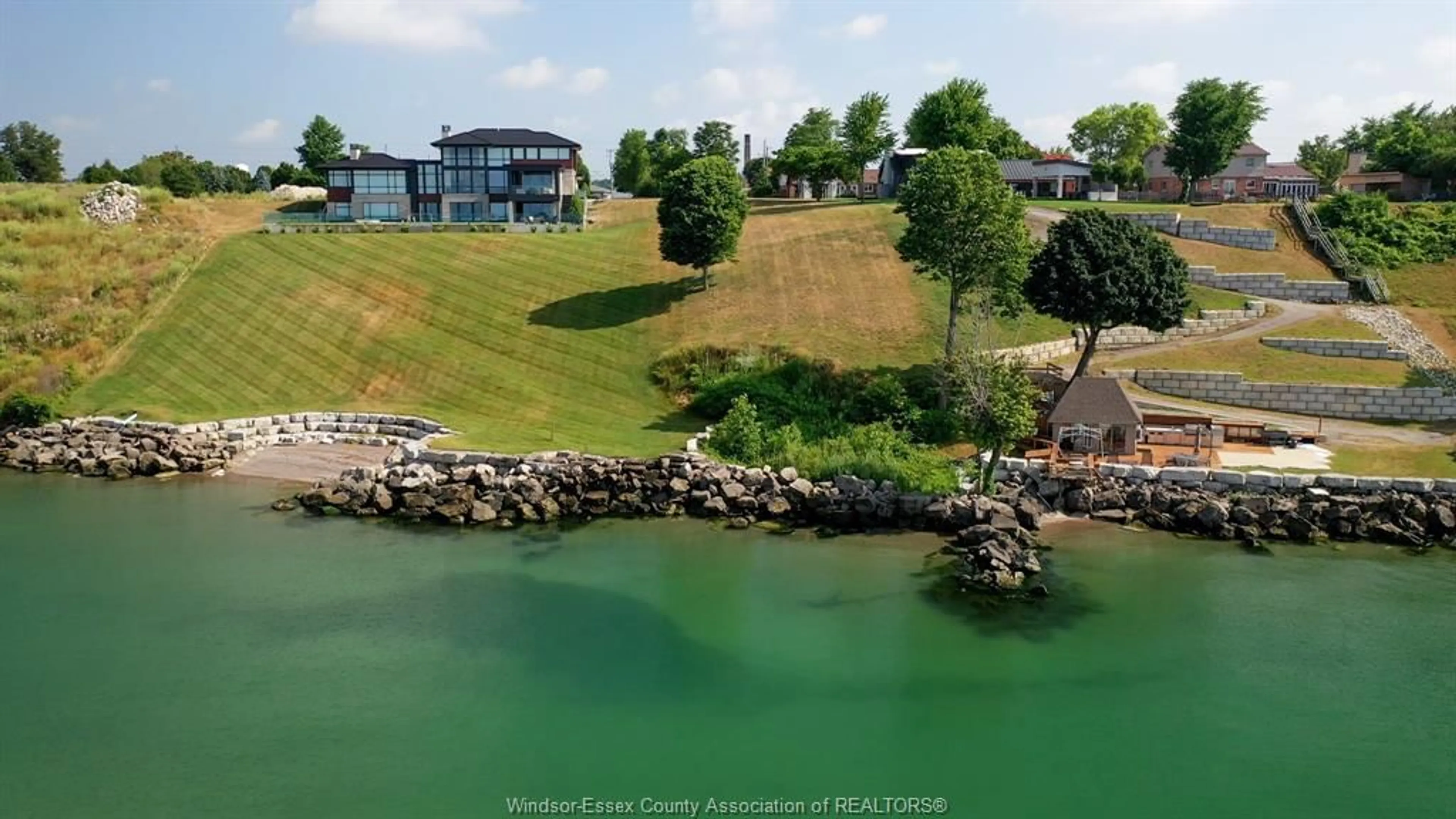 A pic from outside/outdoor area/front of a property/back of a property/a pic from drone, water/lake/river/ocean view for 366 SEACLIFF Dr, Leamington Ontario N8H 4E1