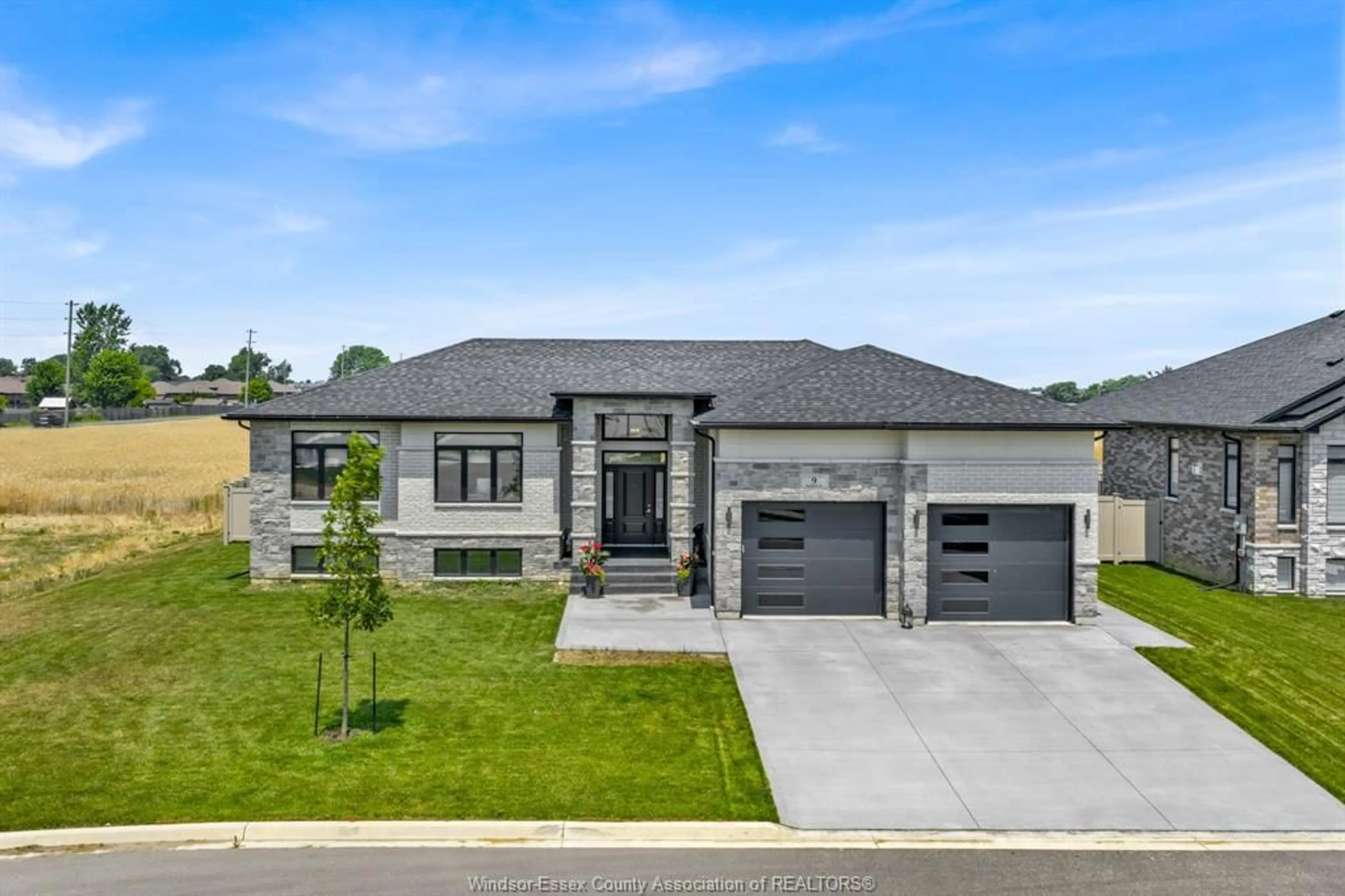Home with brick exterior material, street for 9 SUNNINGDALE Dr, Leamington Ontario N8H 0C4