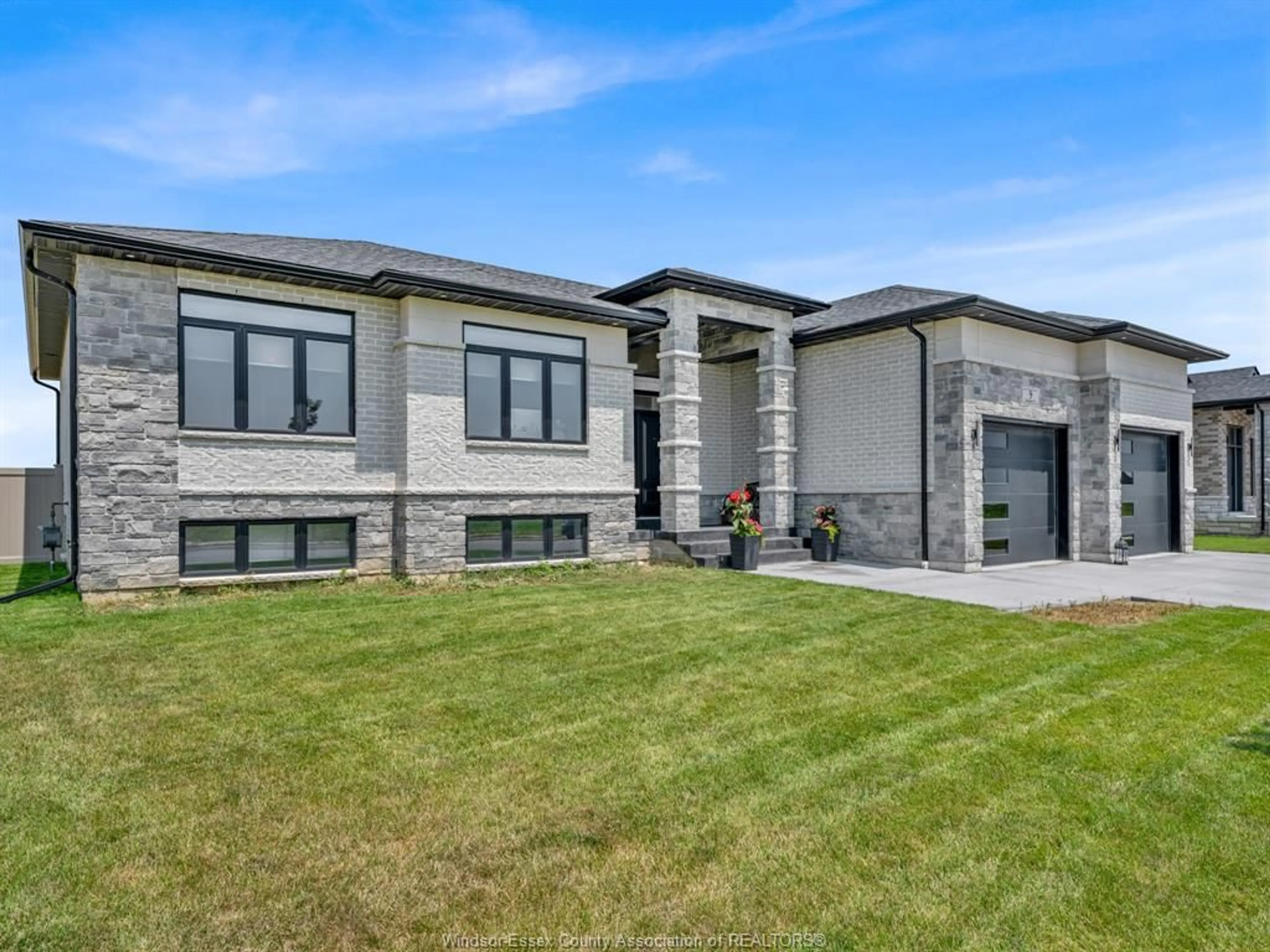 Home with brick exterior material, building for 9 SUNNINGDALE Dr, Leamington Ontario N8H 0C4