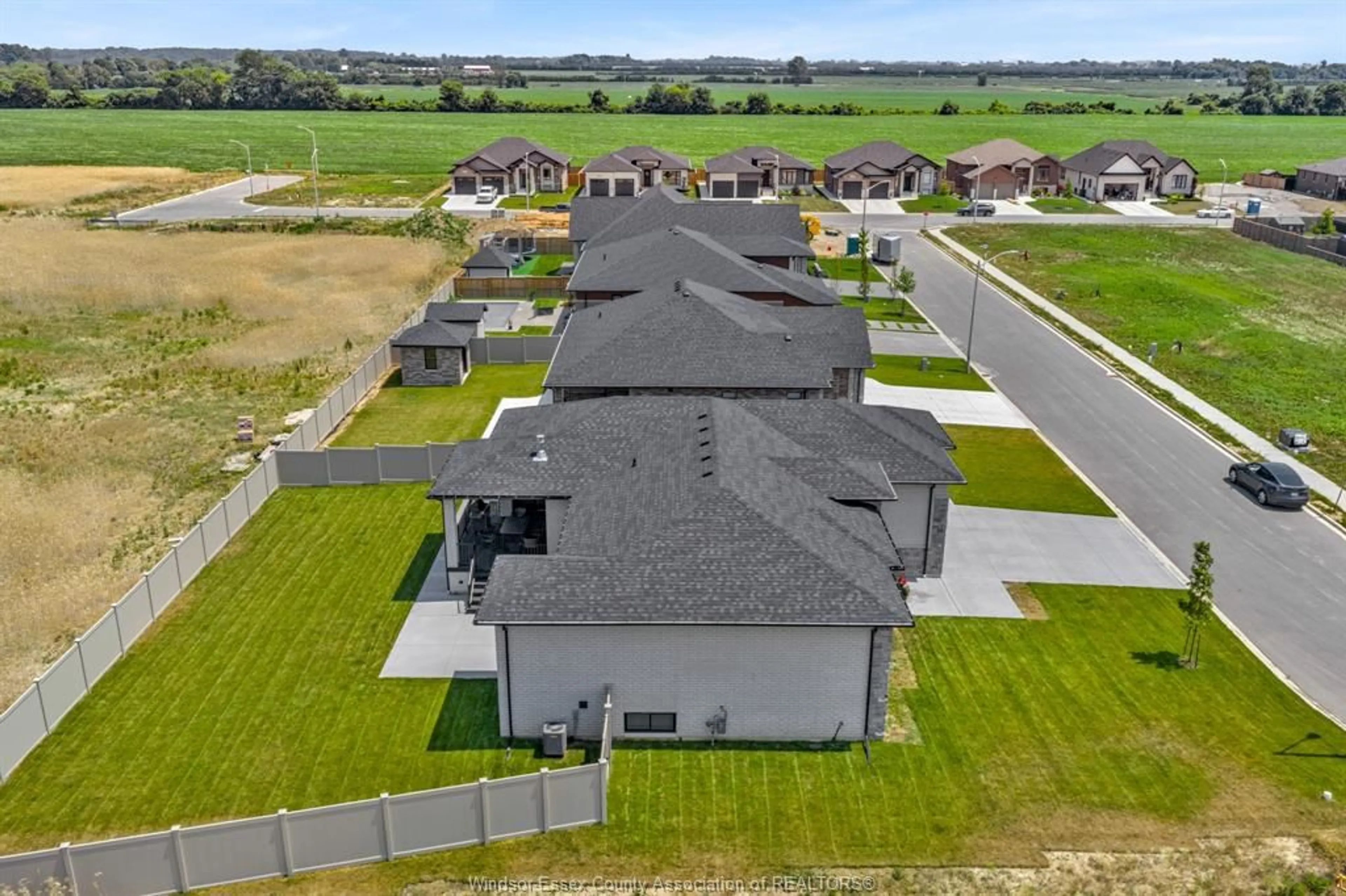 A pic from outside/outdoor area/front of a property/back of a property/a pic from drone, unknown for 9 SUNNINGDALE Dr, Leamington Ontario N8H 0C4