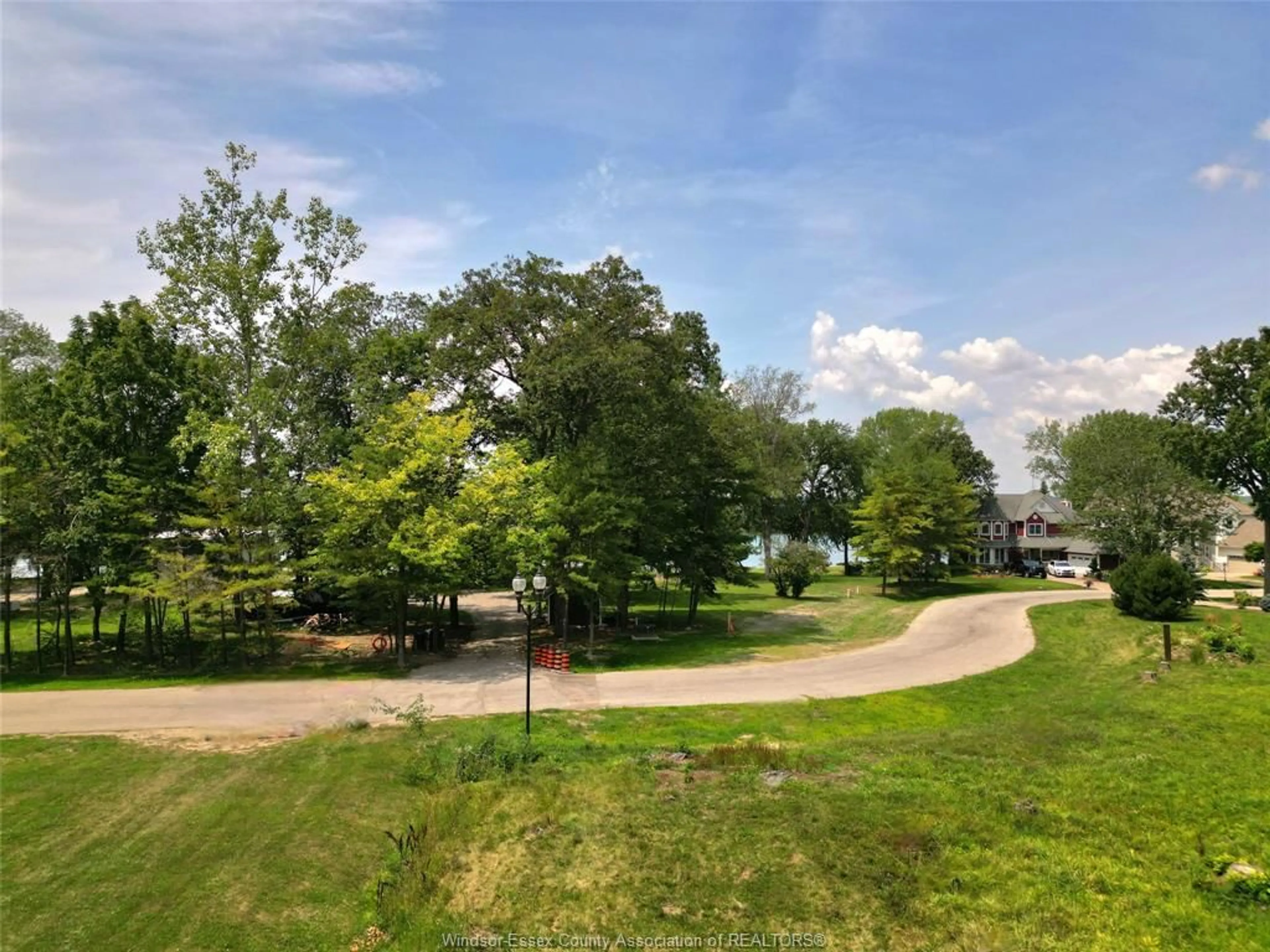A pic from outside/outdoor area/front of a property/back of a property/a pic from drone, unknown for 271 CRYSTAL BAY, Amherstburg Ontario N9V 4A6