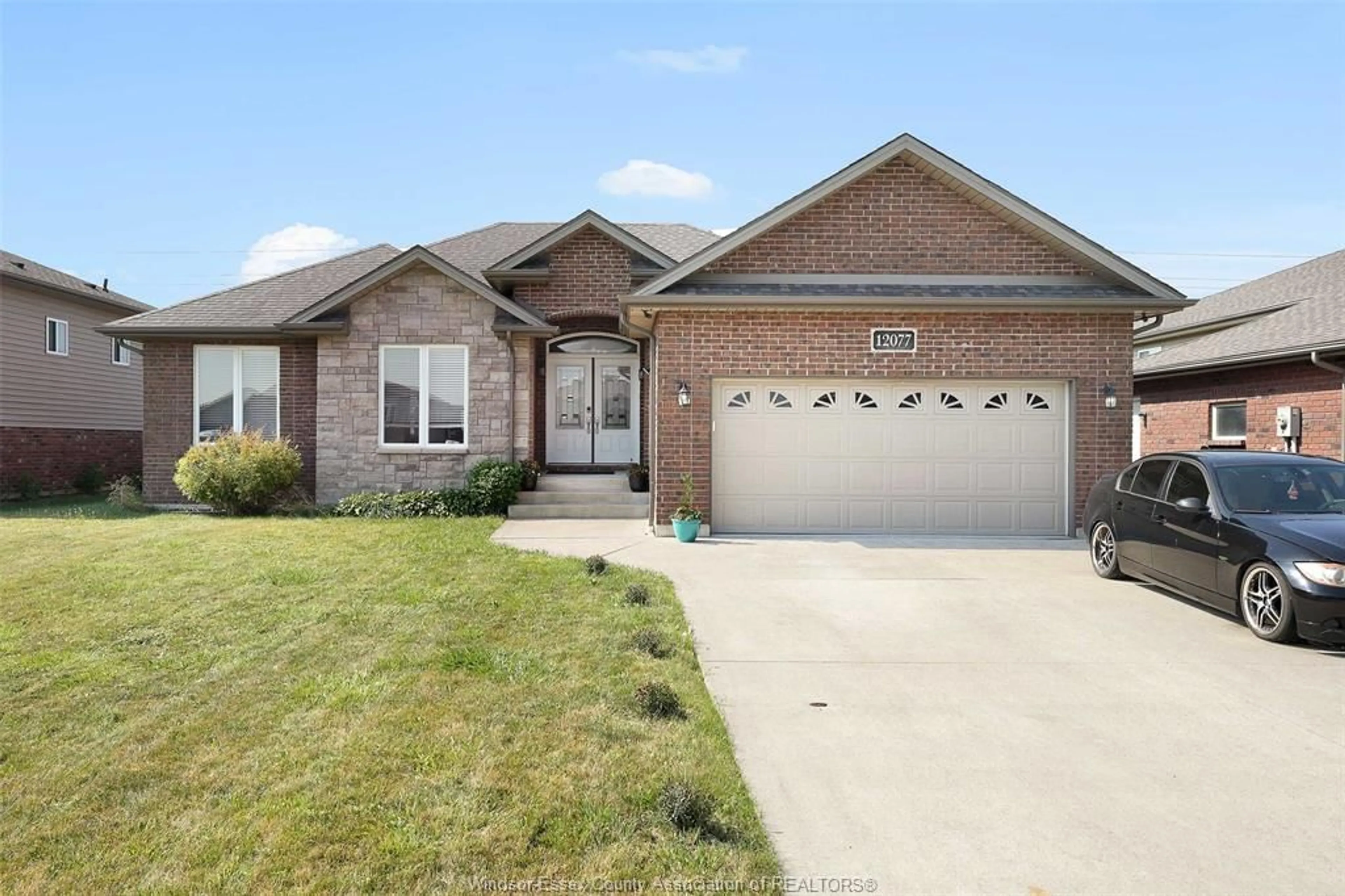 Home with brick exterior material, street for 12077 DUCHARME Lane, McGregor Ontario N0R 1J0