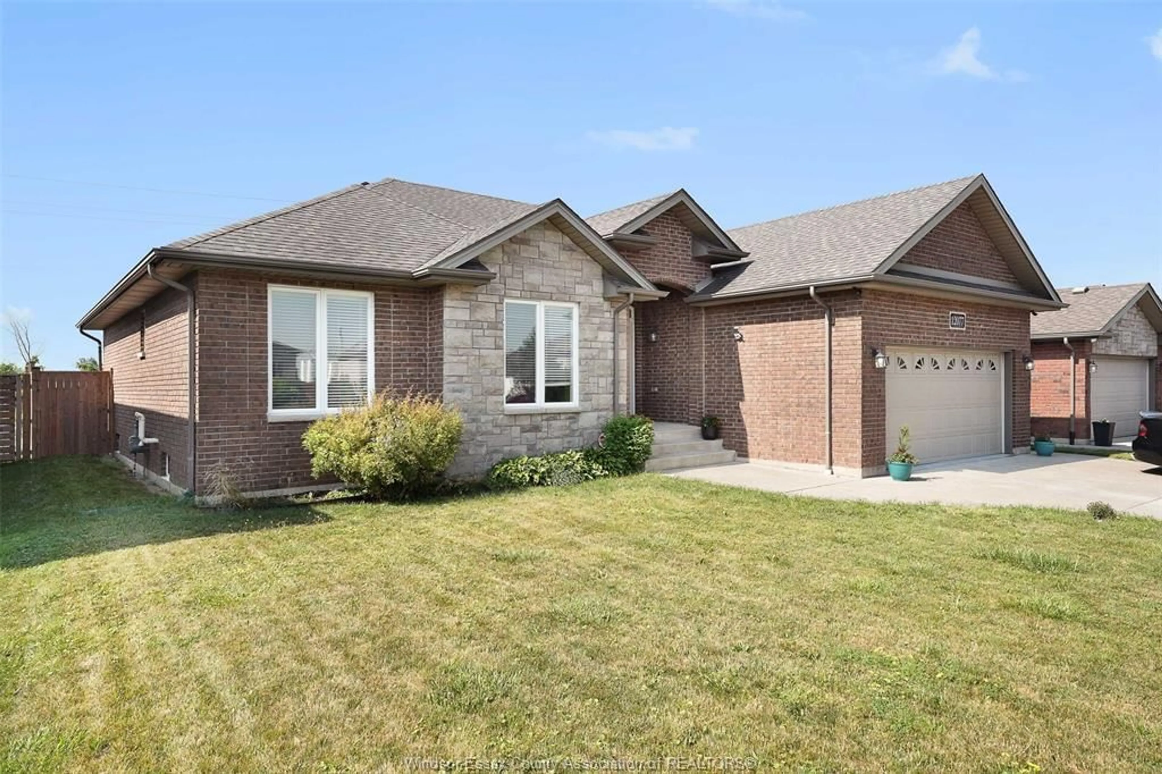 Home with brick exterior material, street for 12077 DUCHARME Lane, McGregor Ontario N0R 1J0
