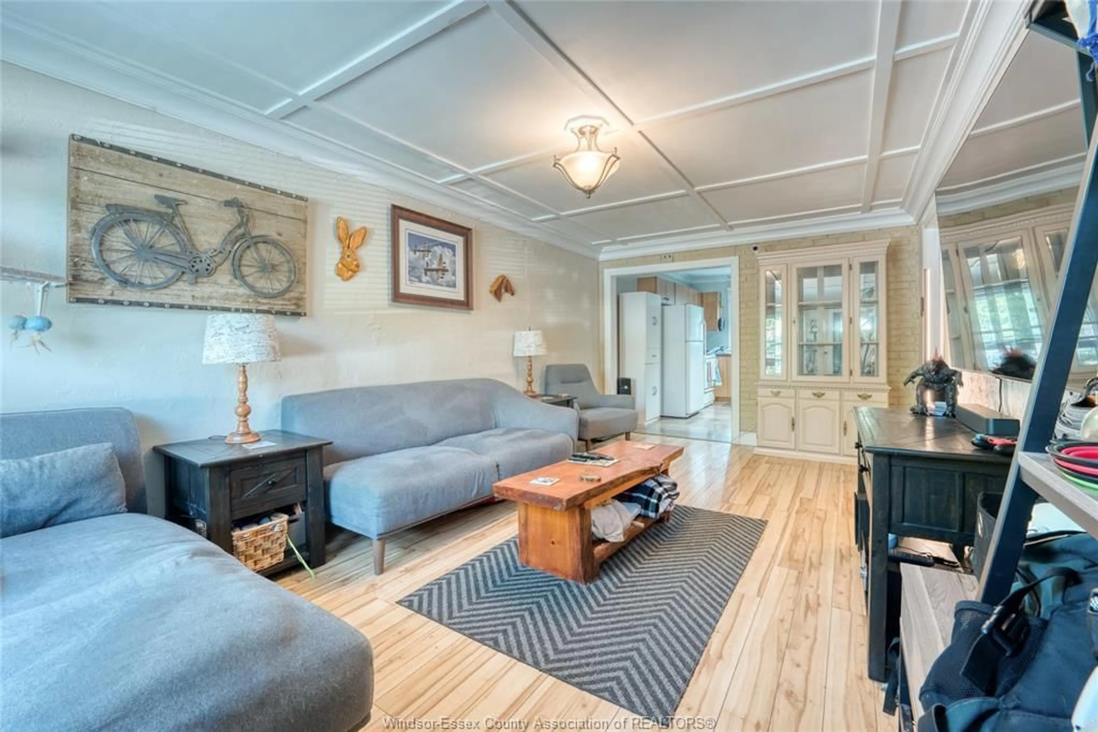 Living room with furniture, wood/laminate floor for 2009 BUCKINGHAM, Windsor Ontario N8T 2B2